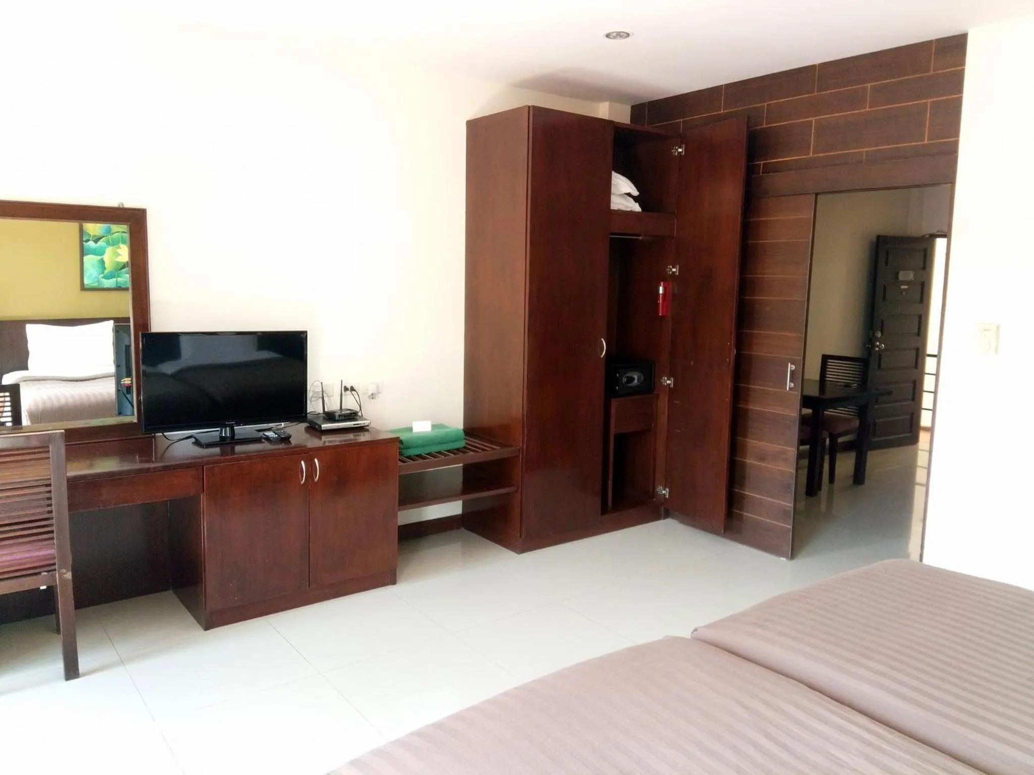 Bed in Kamala Beachfront Apartment