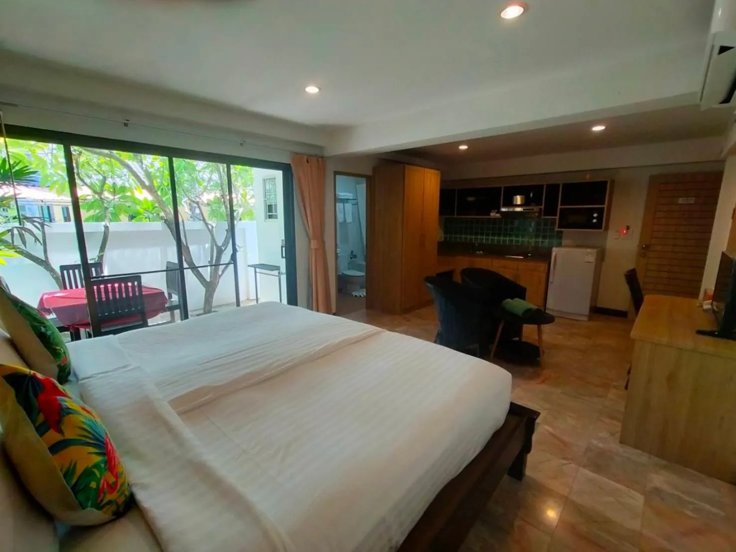Bed in Kamala Beachfront Apartment