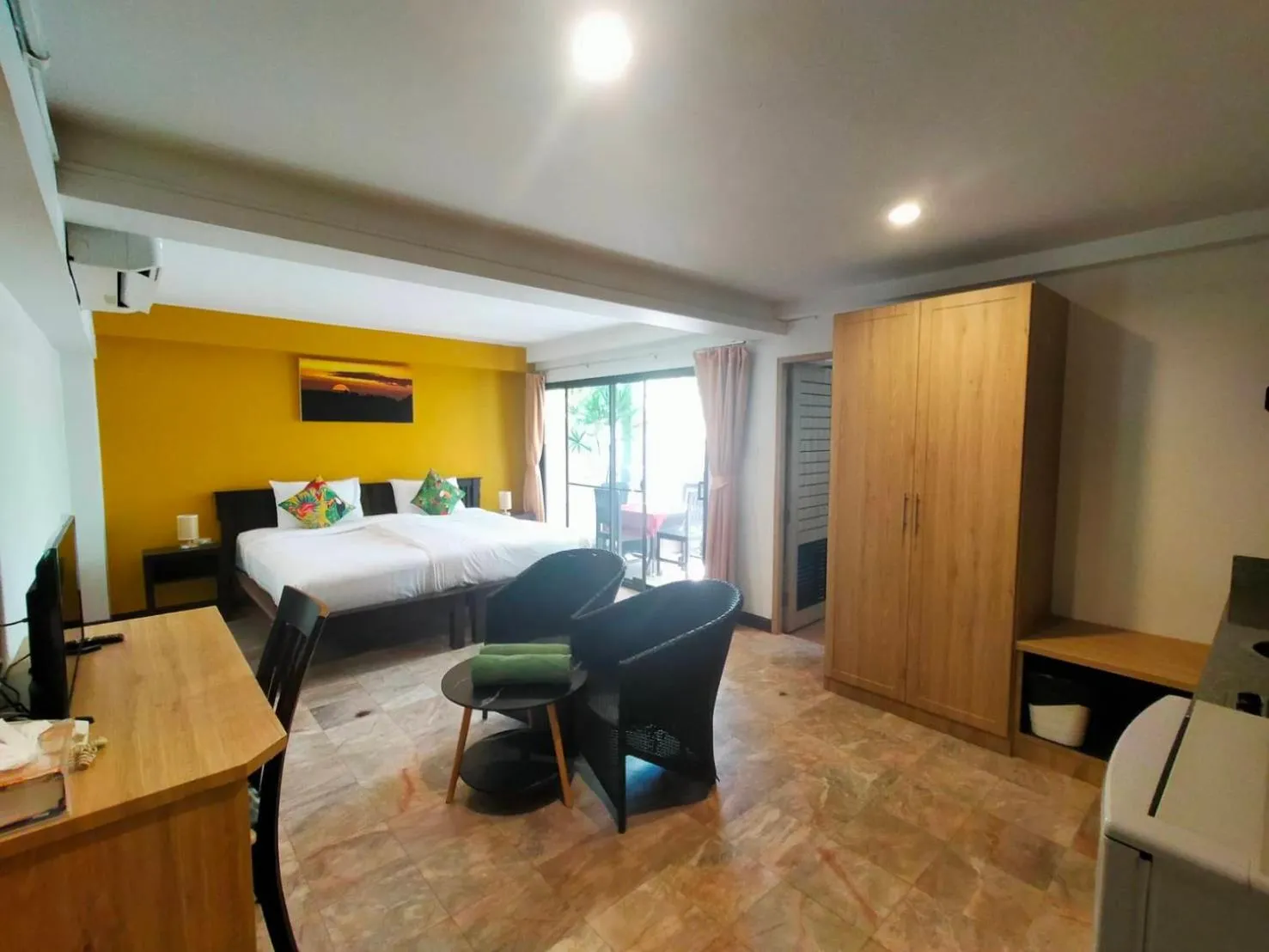 Bed in Kamala Beachfront Apartment