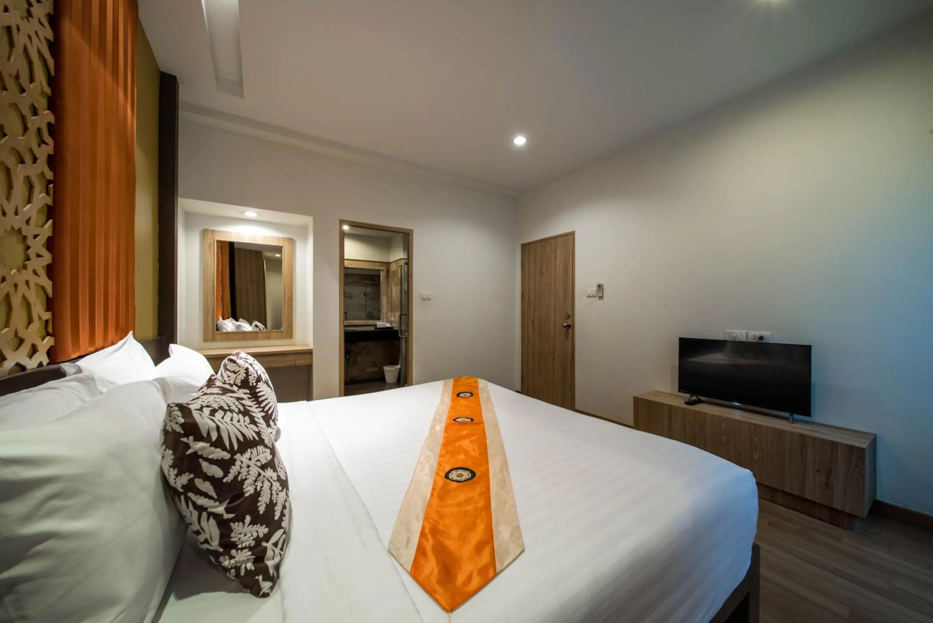 Bed in Kamala Beachfront Apartment