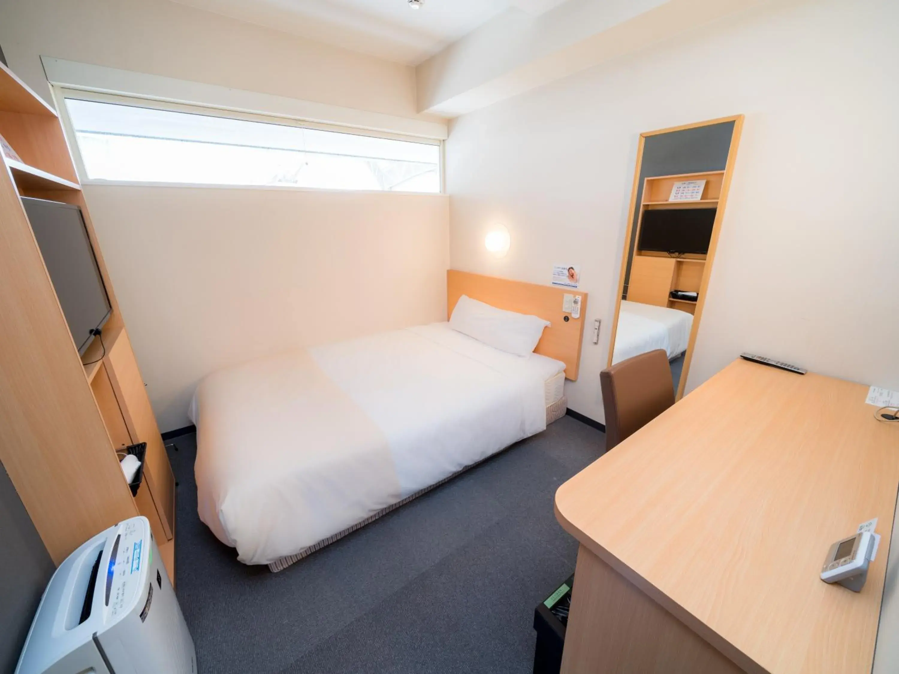 Bed in Super Hotel Takamatsu Tamachi Bed in Super Hotel Takamatsu Tamachi