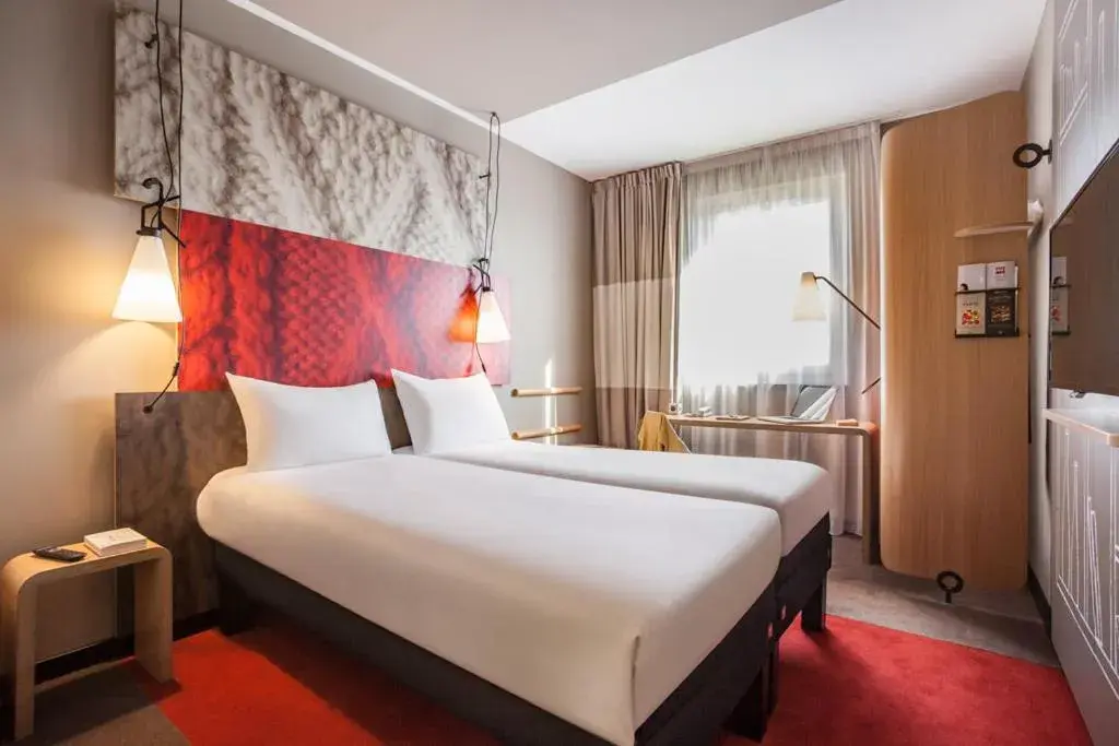 Bed in ibis Paris Le Bourget Bed in ibis Paris Le Bourget