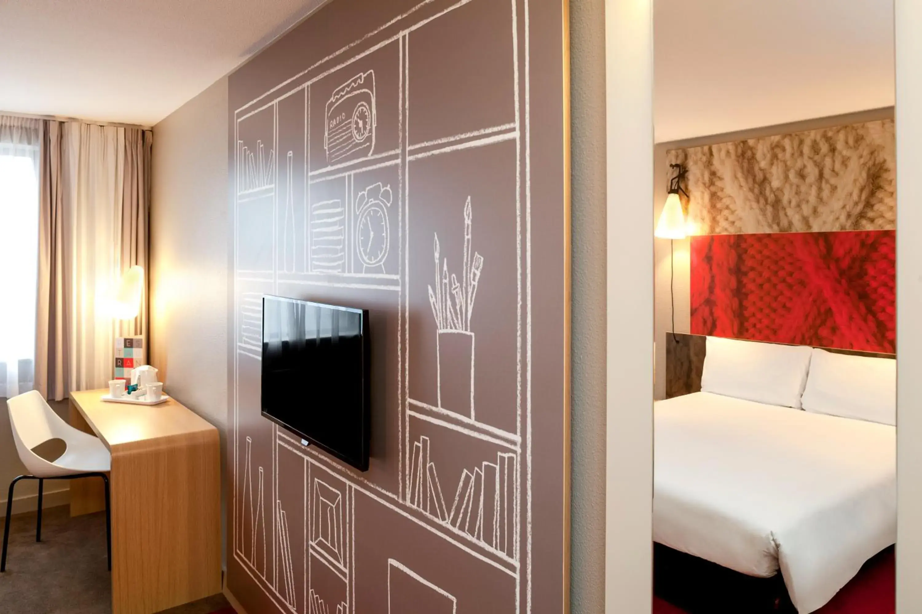 Seating area, Bed in ibis Paris Le Bourget Seating area, Bed in ibis Paris Le Bourget