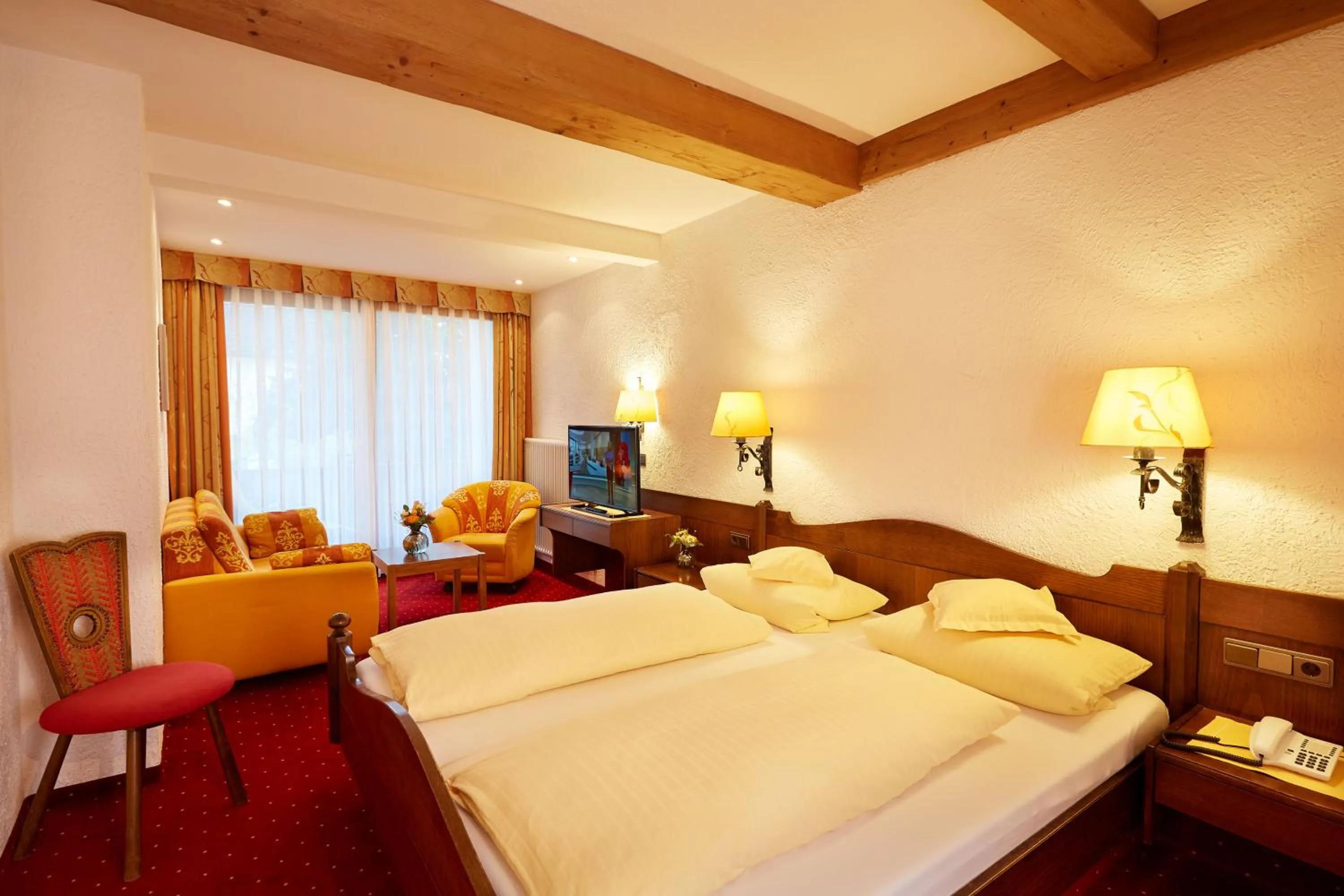 Photo of the whole room, Bed in Kurhotel Eichinger