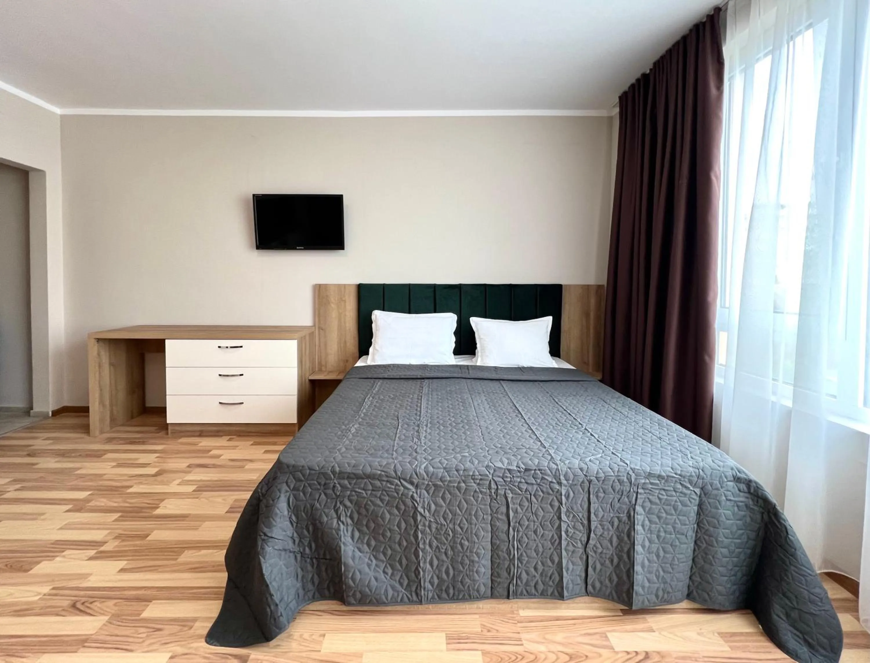 Bed in Sineva Del Sol Apartments