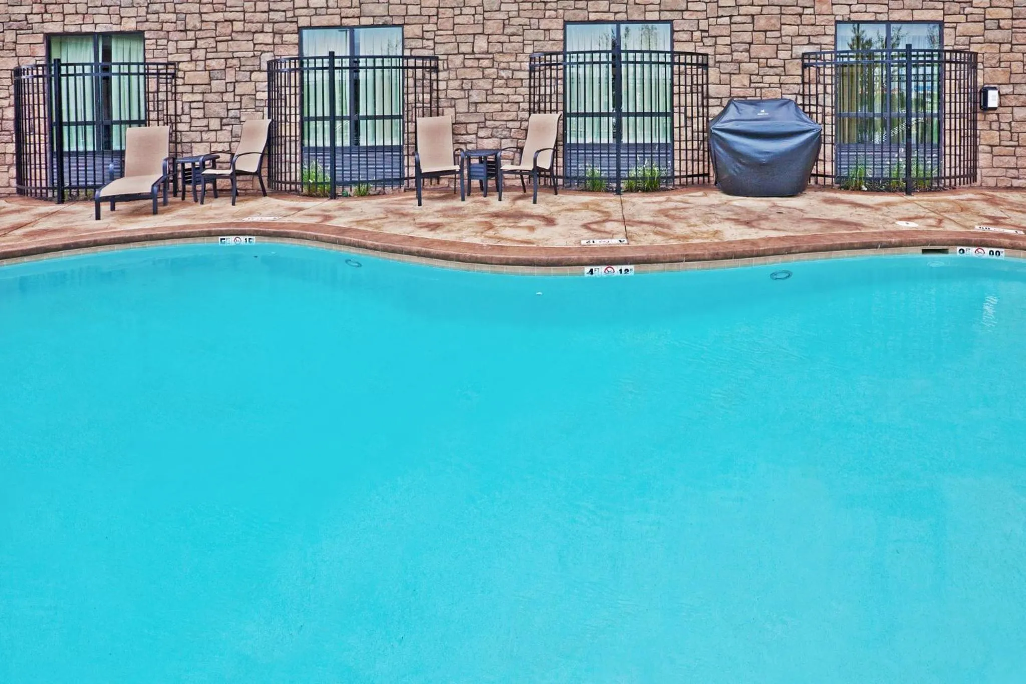 Swimming pool in Holiday Inn & Suites Stillwater-University West by IHG
