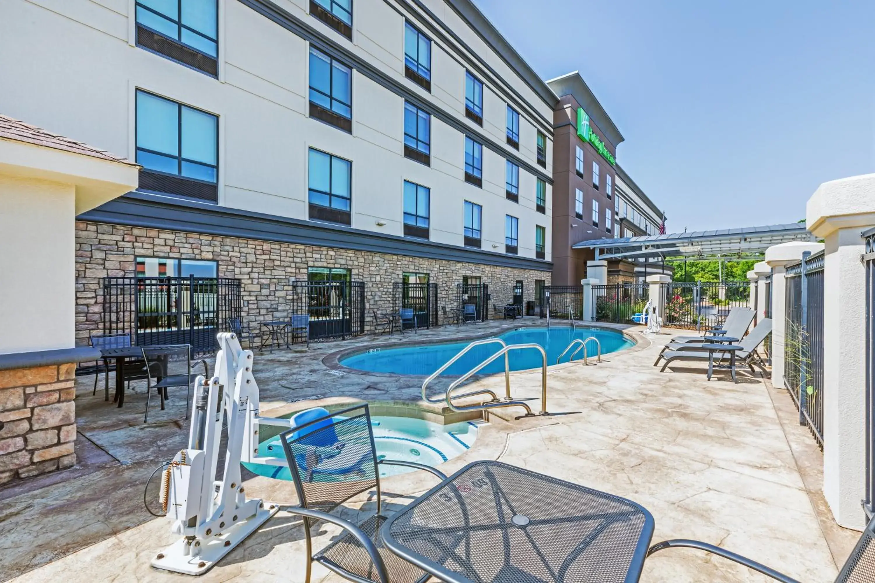 Swimming pool in Holiday Inn & Suites Stillwater-University West by IHG Swimming pool in Holiday Inn & Suites Stillwater-University West by IHG