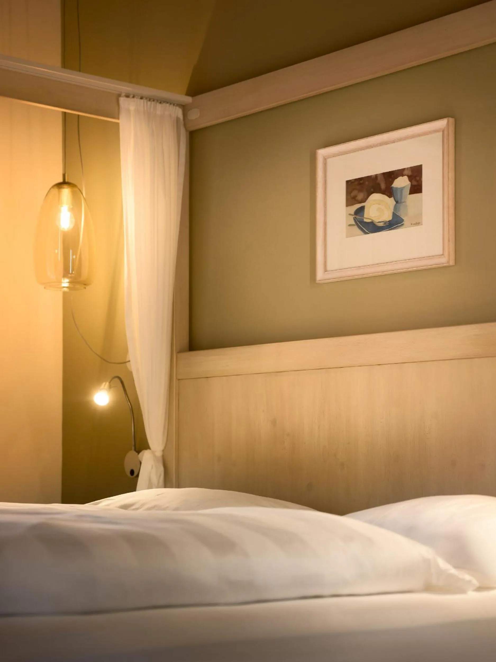 Bed in Dolomit Boutique Hotel