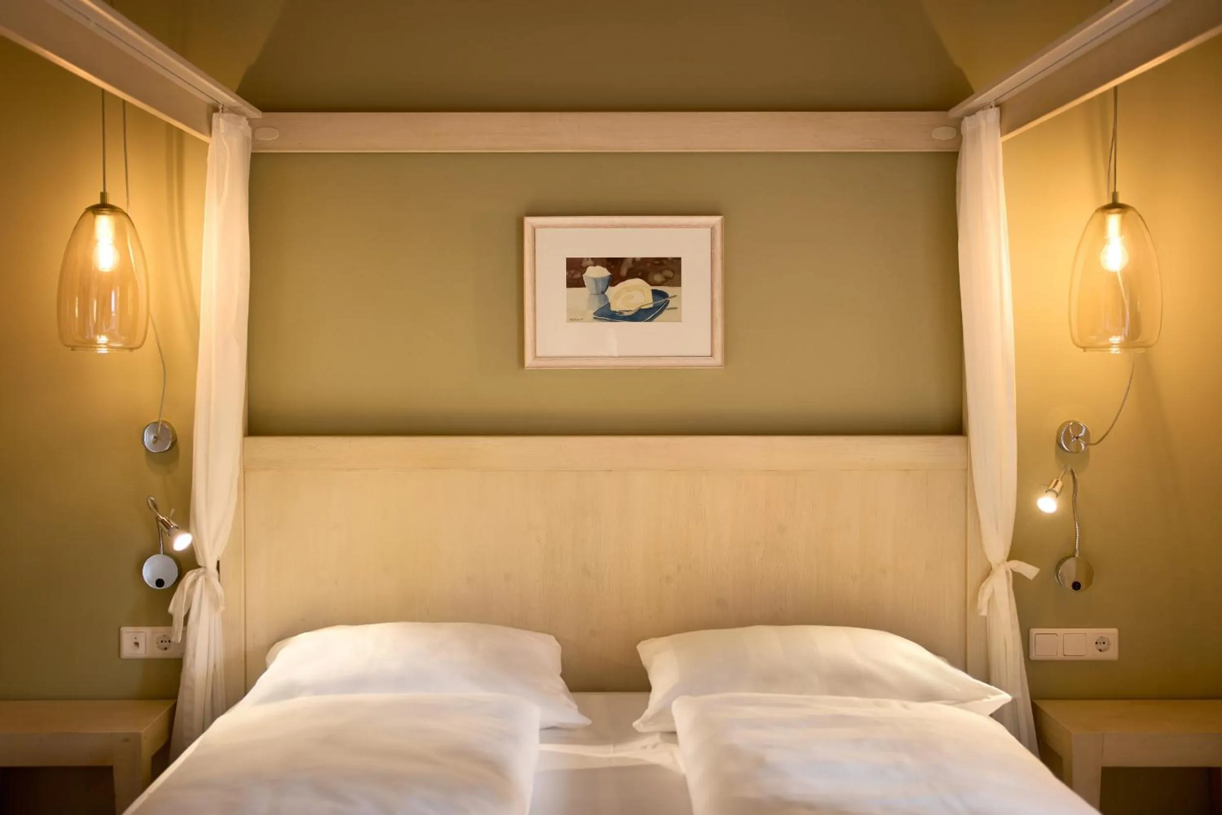 Bed in Dolomit Boutique Hotel