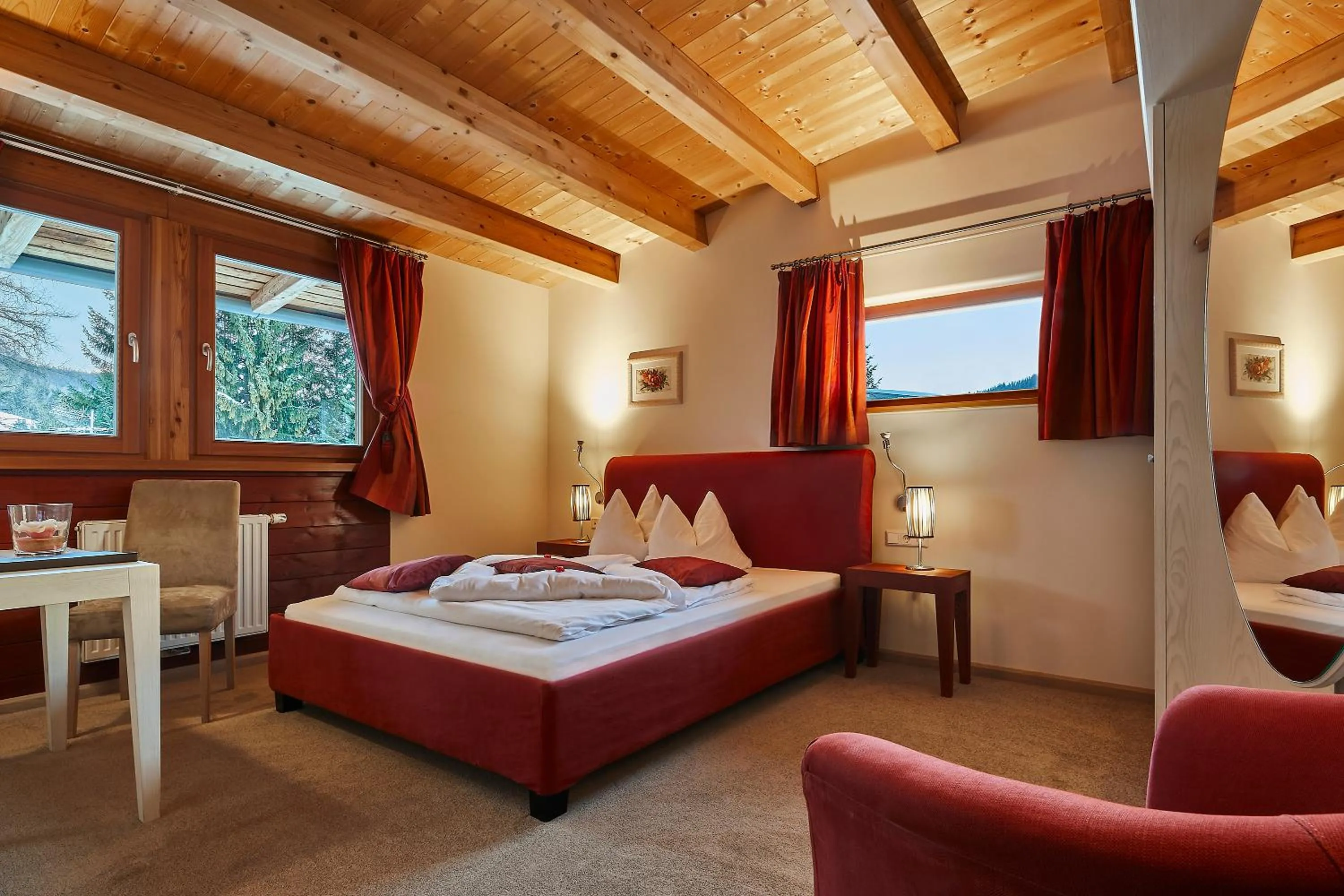Photo of the whole room, Bed in Dolomit Boutique Hotel