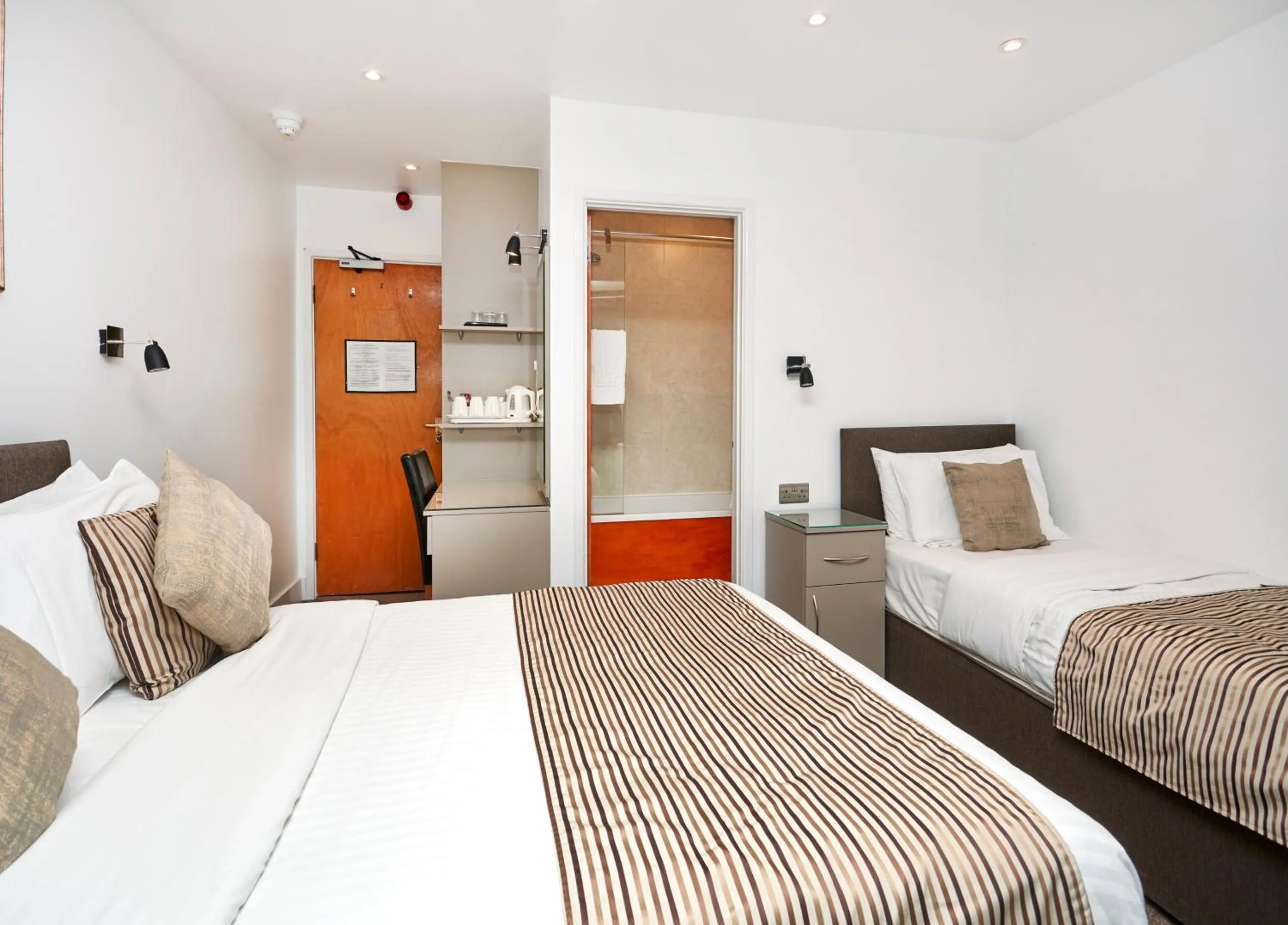 Bed in Conifers Guest House