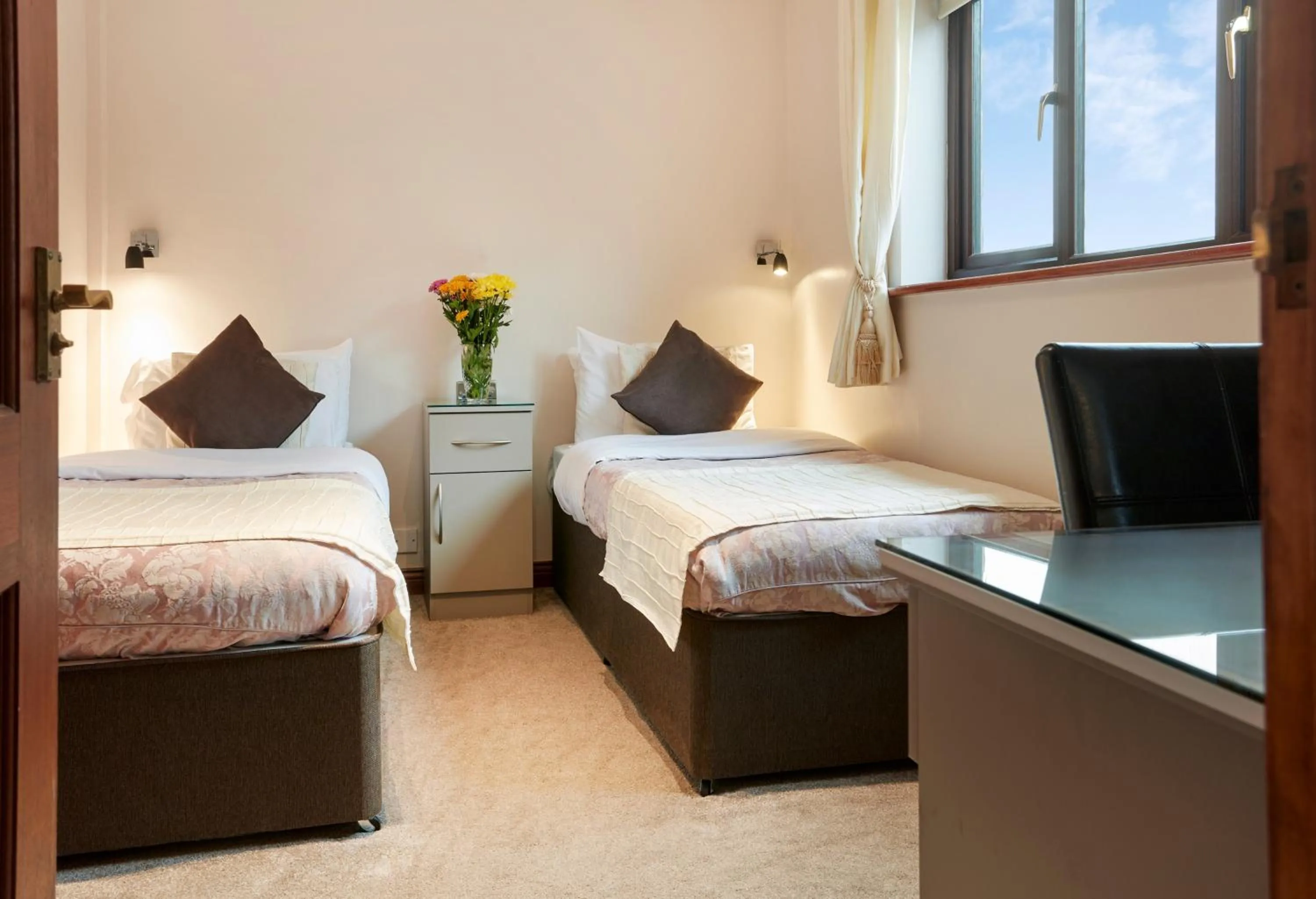 Bed in Conifers Guest House