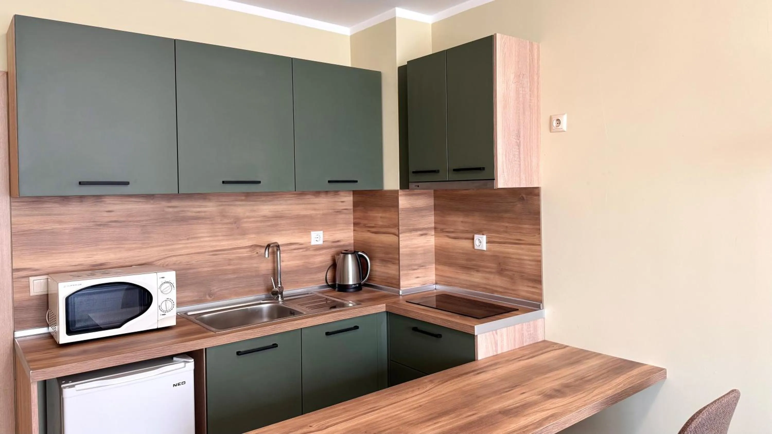 Kitchen or kitchenette in Evi Apartments 2