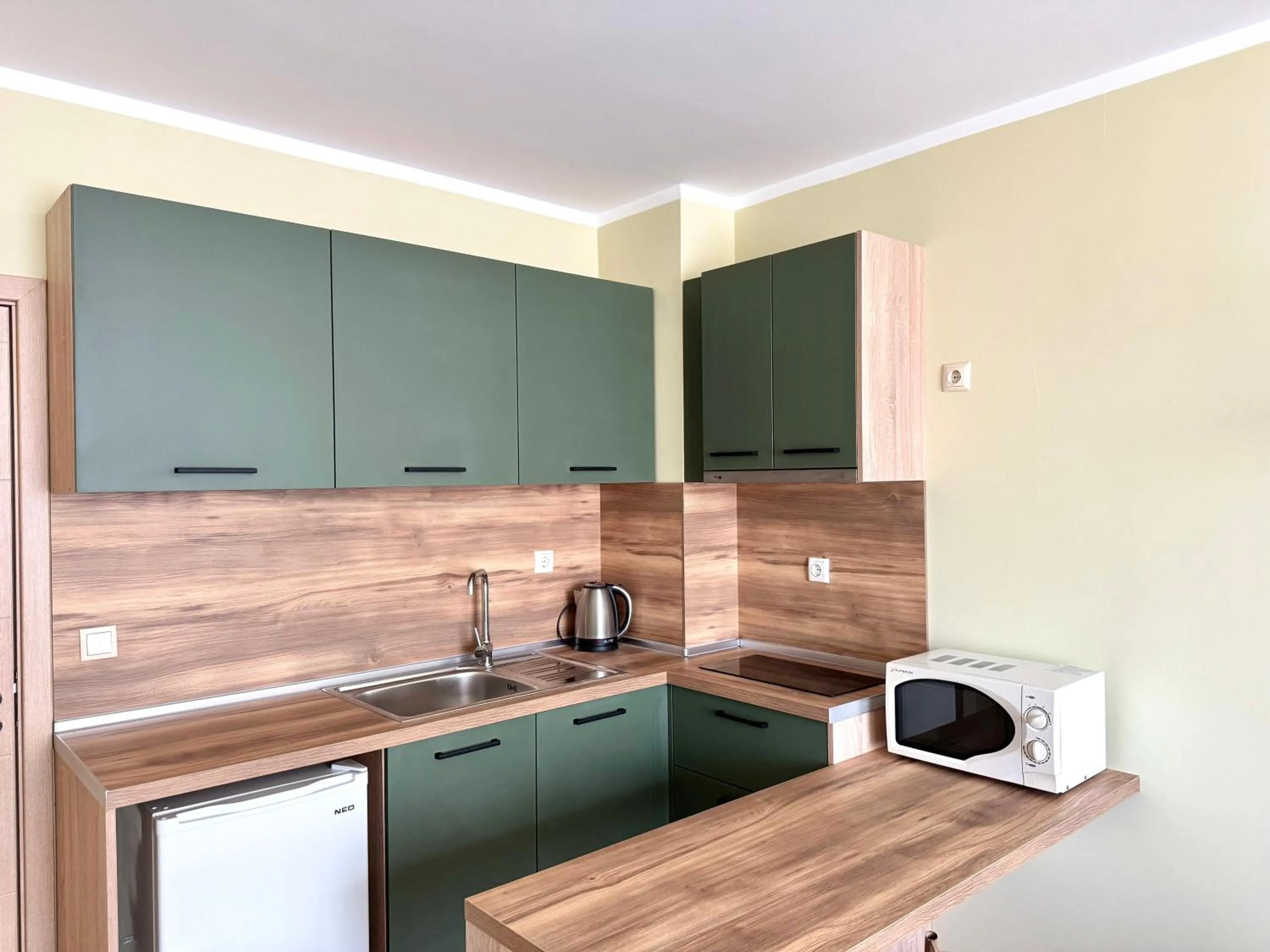 Kitchen or kitchenette in Evi Apartments 2