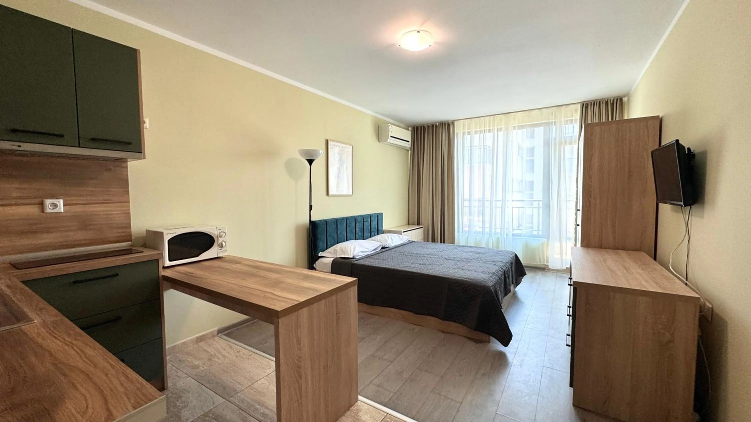 Communal lounge/ TV room, Bed in Evi Apartments 2