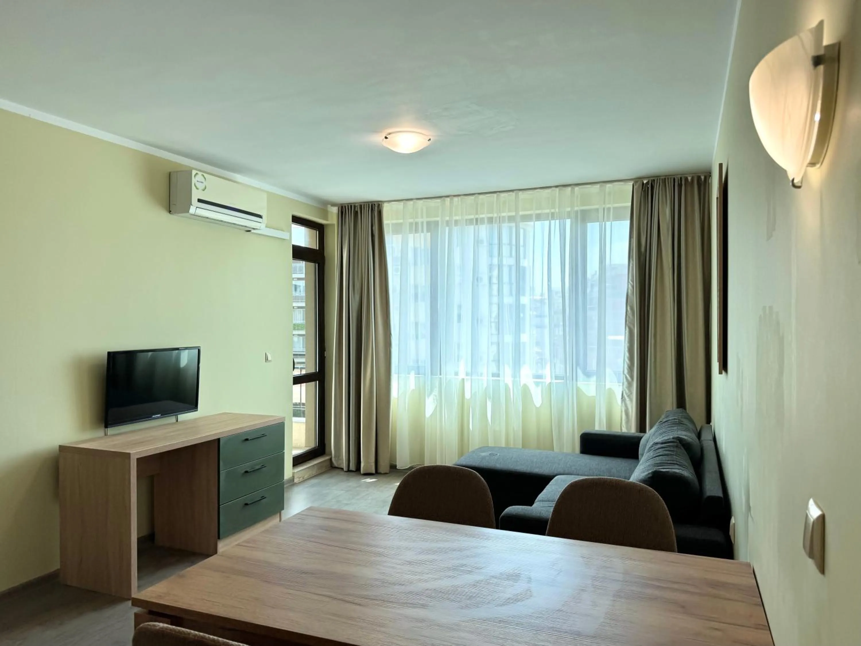 Communal lounge/ TV room in Evi Apartments 2