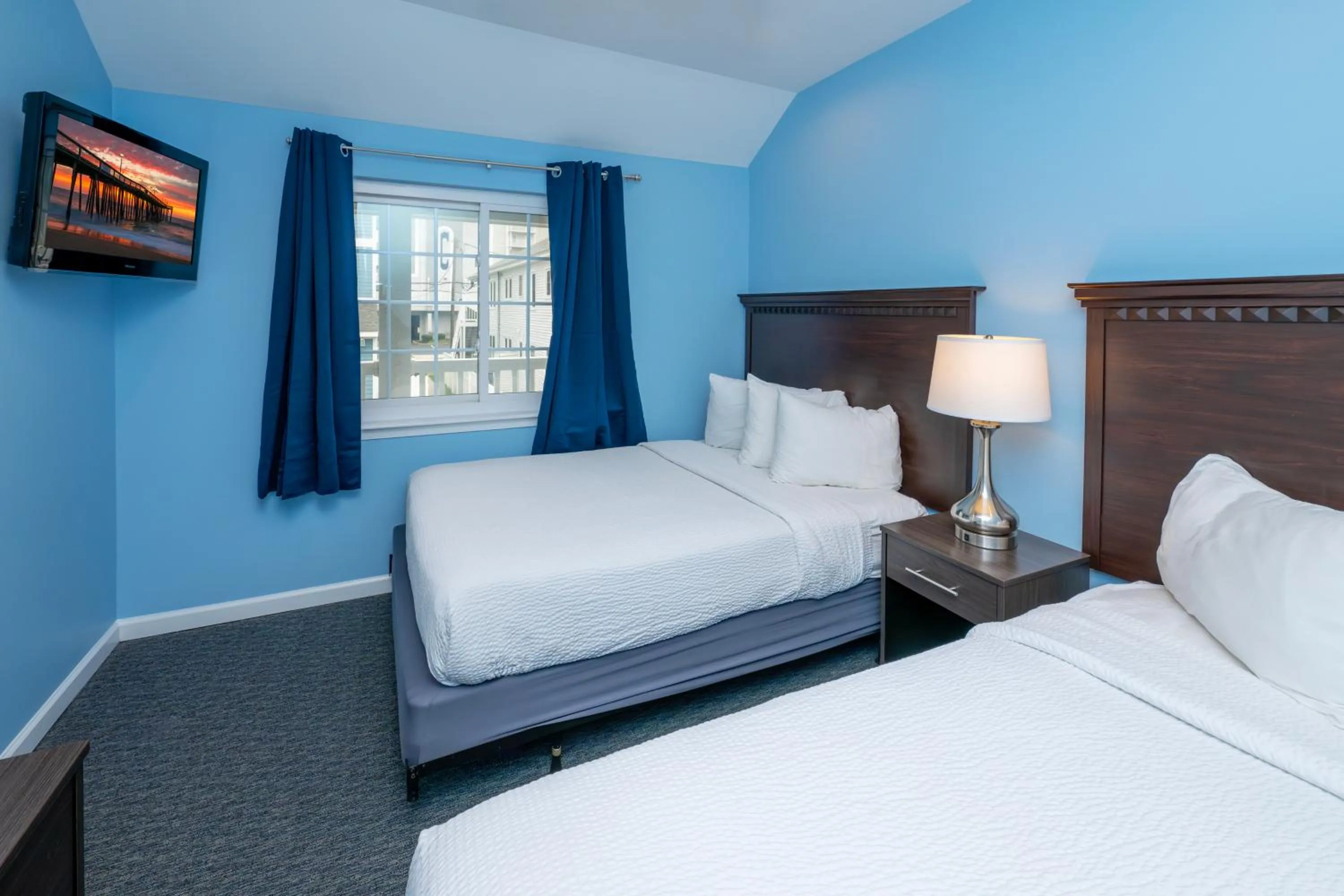 Bed in Commander Beach House Hotel