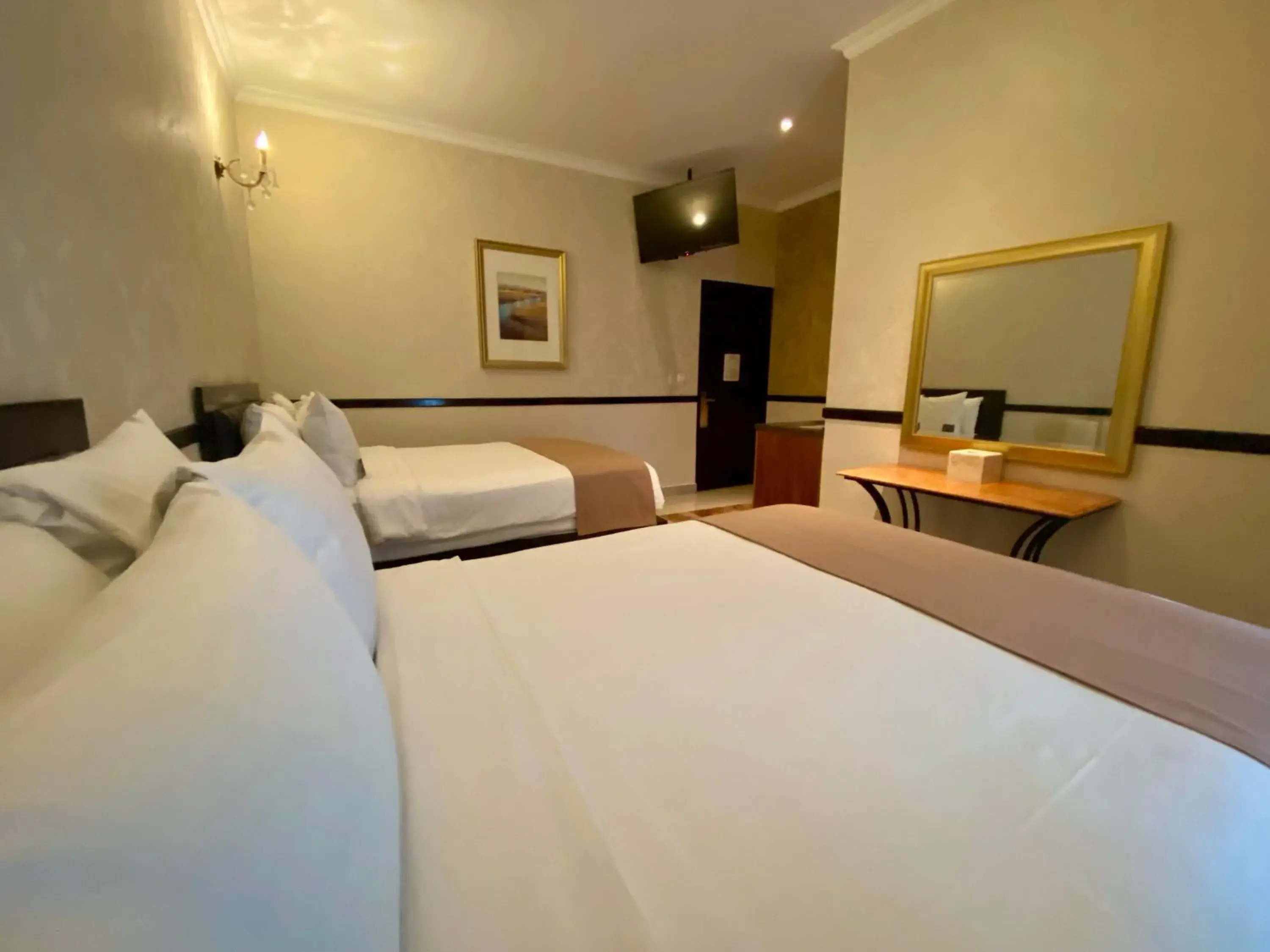 Photo of the whole room, Bed in Hotel Palacio Maya Photo of the whole room, Bed in Hotel Palacio Maya