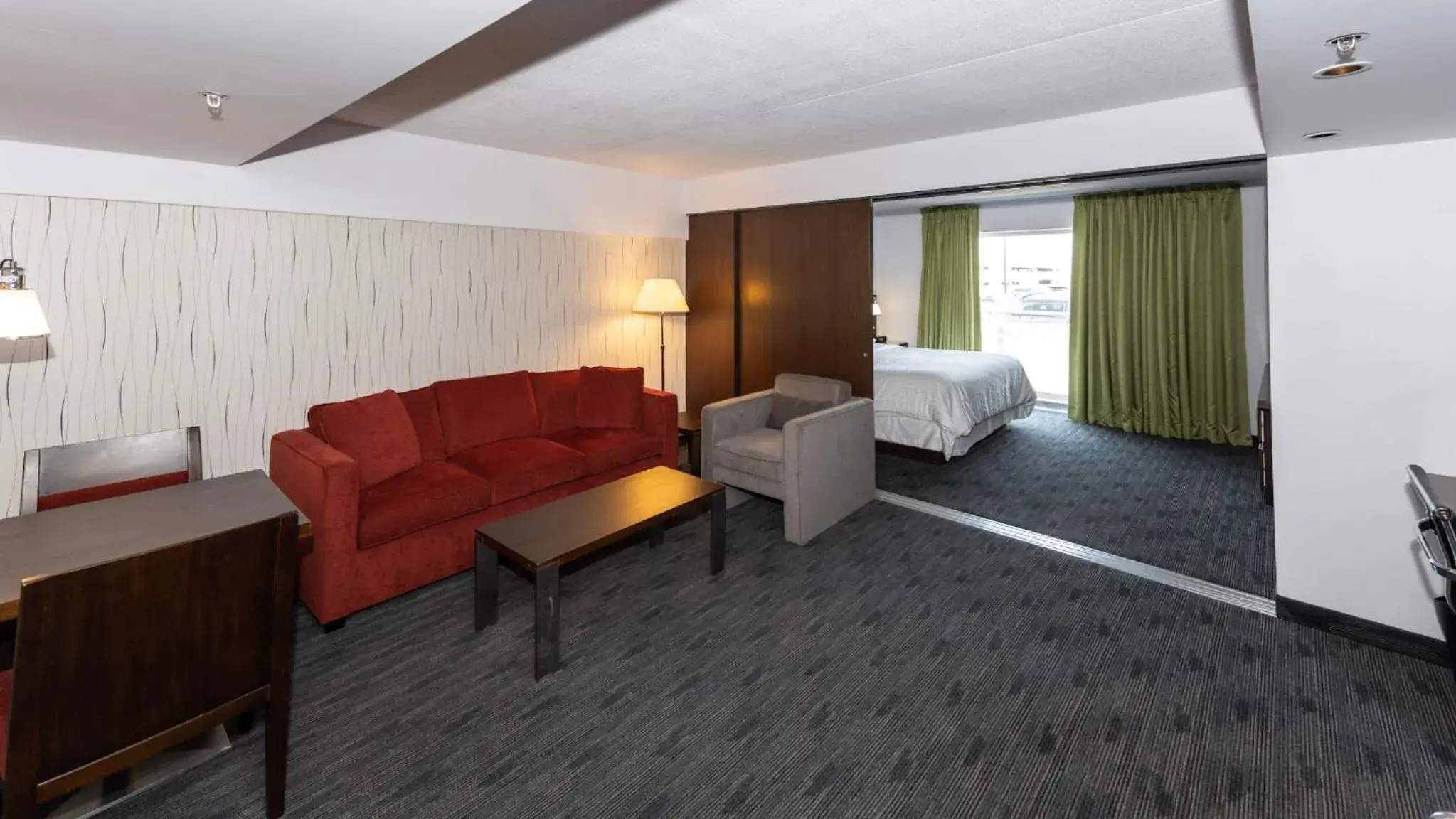 Seating area, Bed in Lakeview Signature, Trademark Collection by Wyndham Seating area, Bed in Lakeview Signature, Trademark Collection by Wyndham