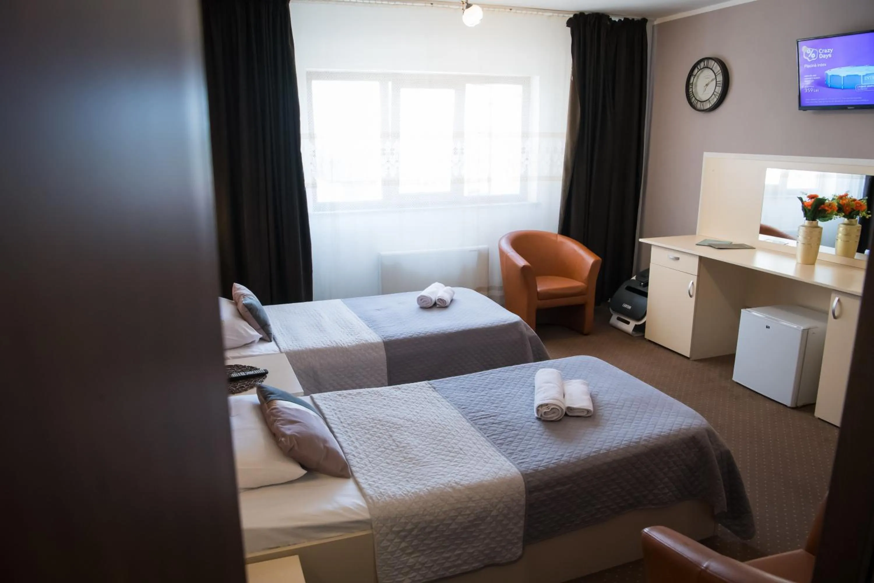 Bed in MBI Travel Inn