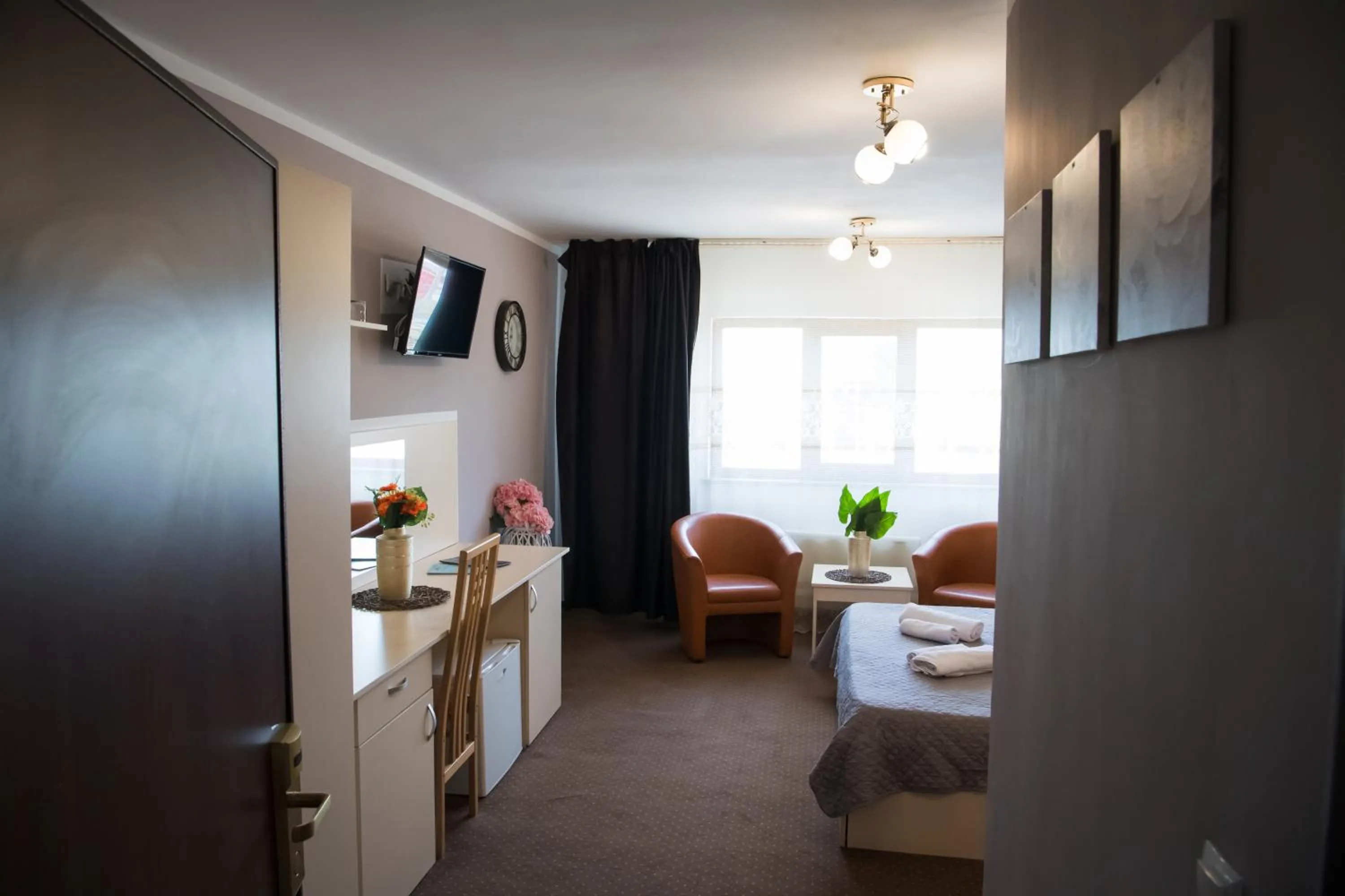 Bed in MBI Travel Inn