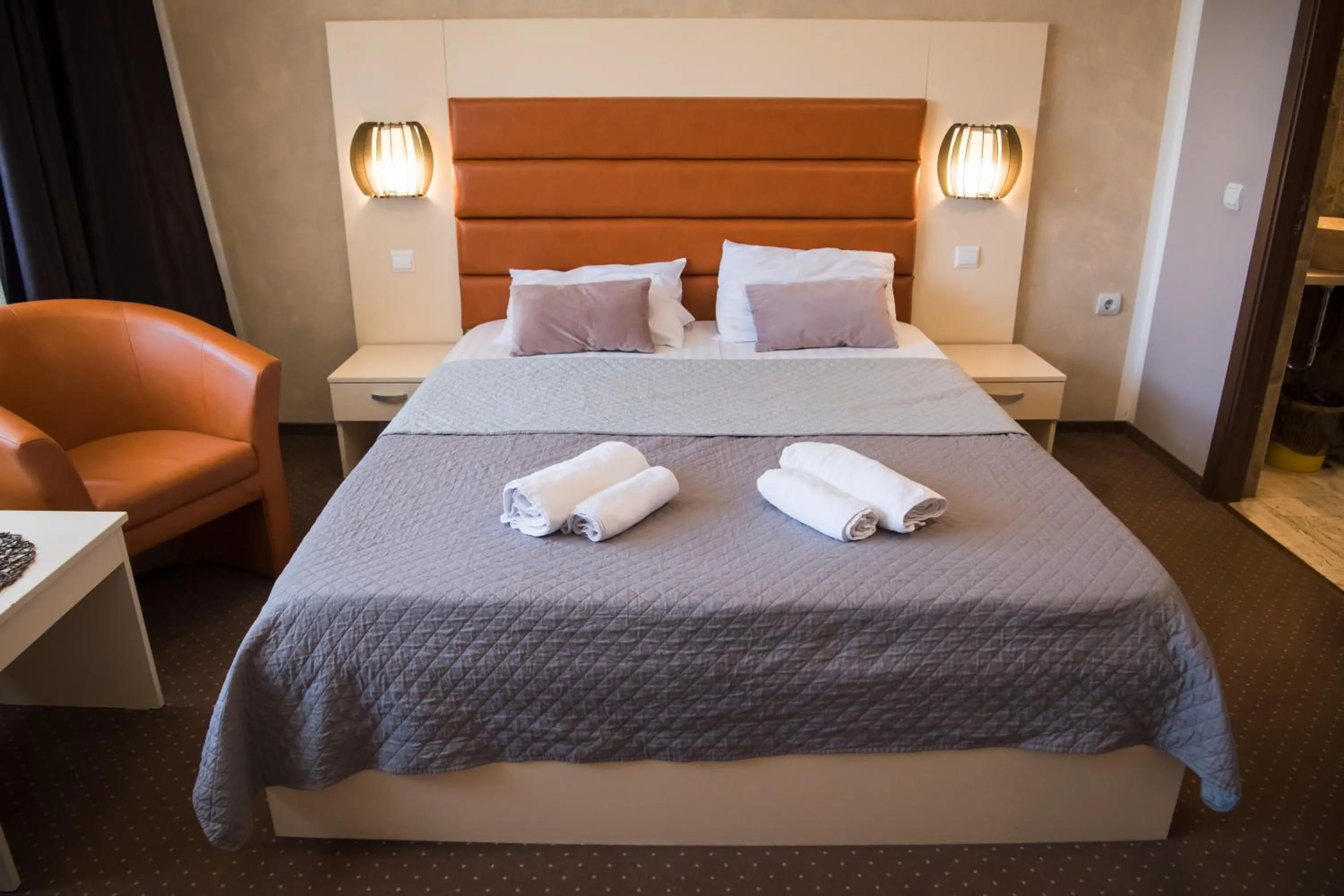 Bed in MBI Travel Inn