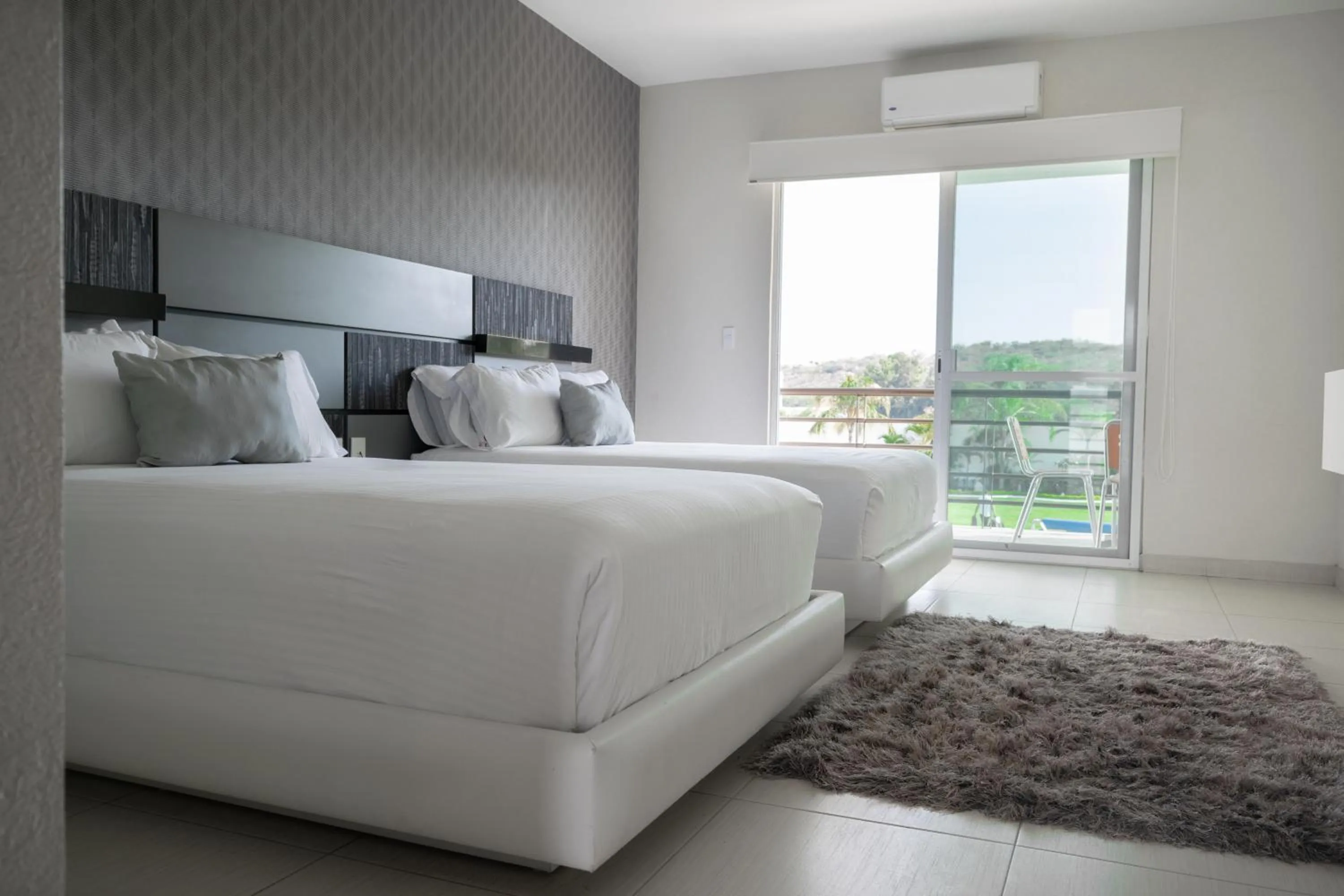 Bed in Hotel Aquetzalli