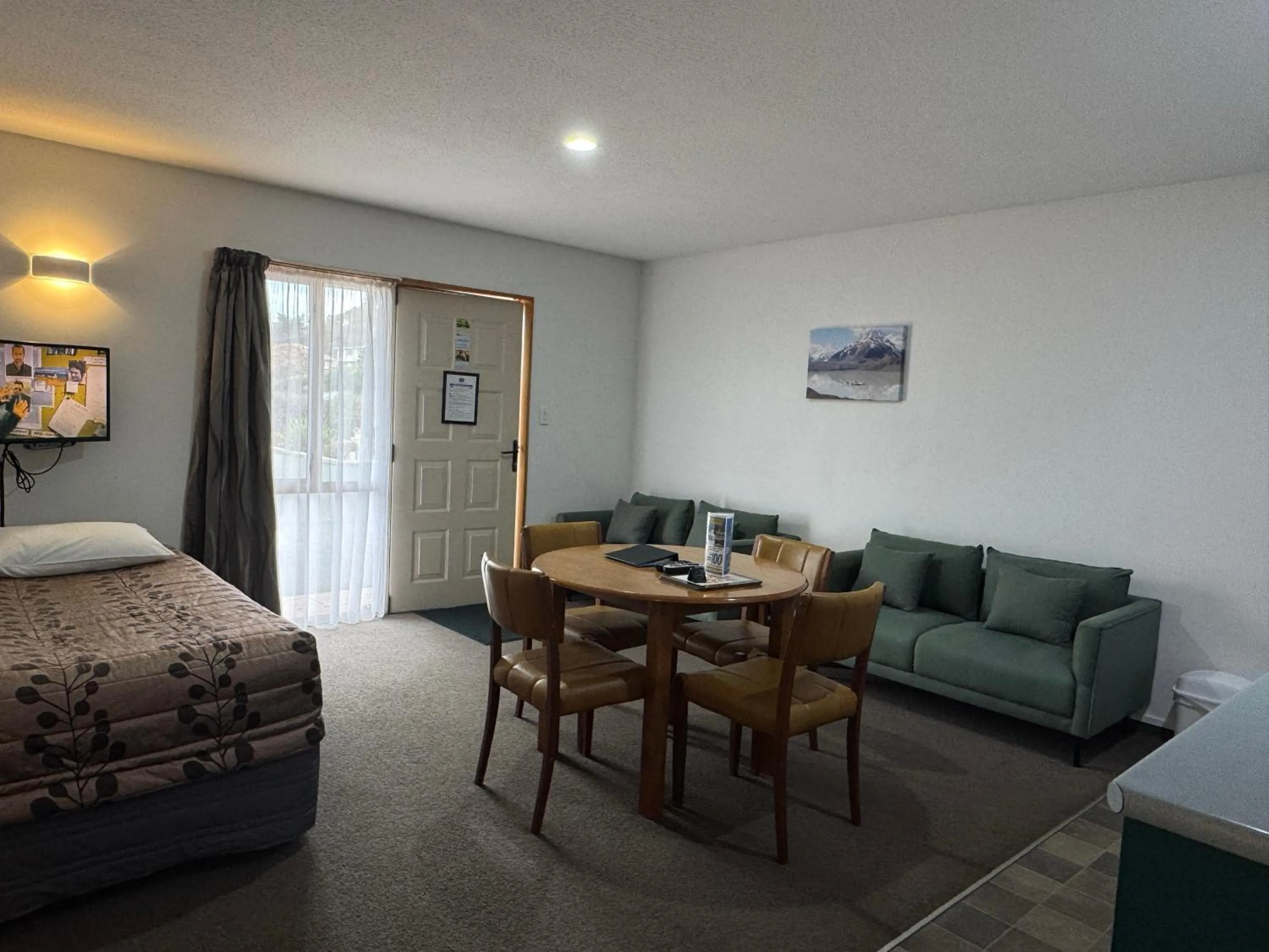 Bed in ASURE Ambassador Motor Lodge