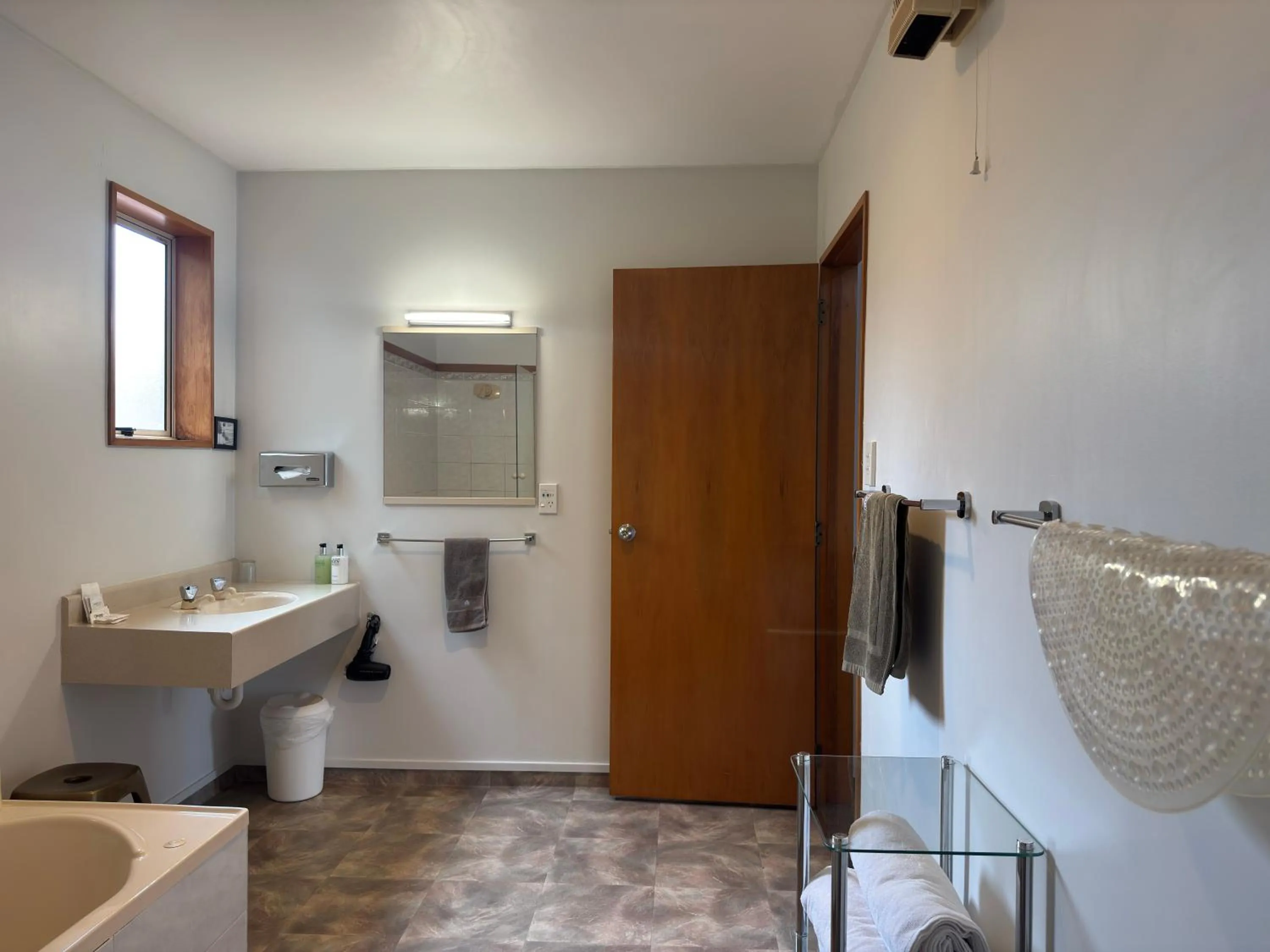 Bathroom in ASURE Ambassador Motor Lodge