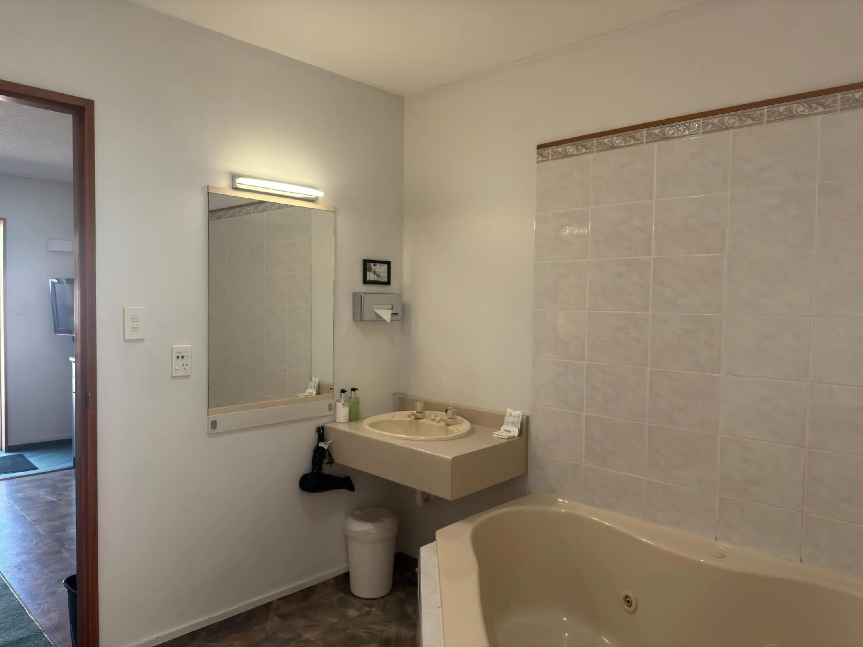 Bathroom in ASURE Ambassador Motor Lodge