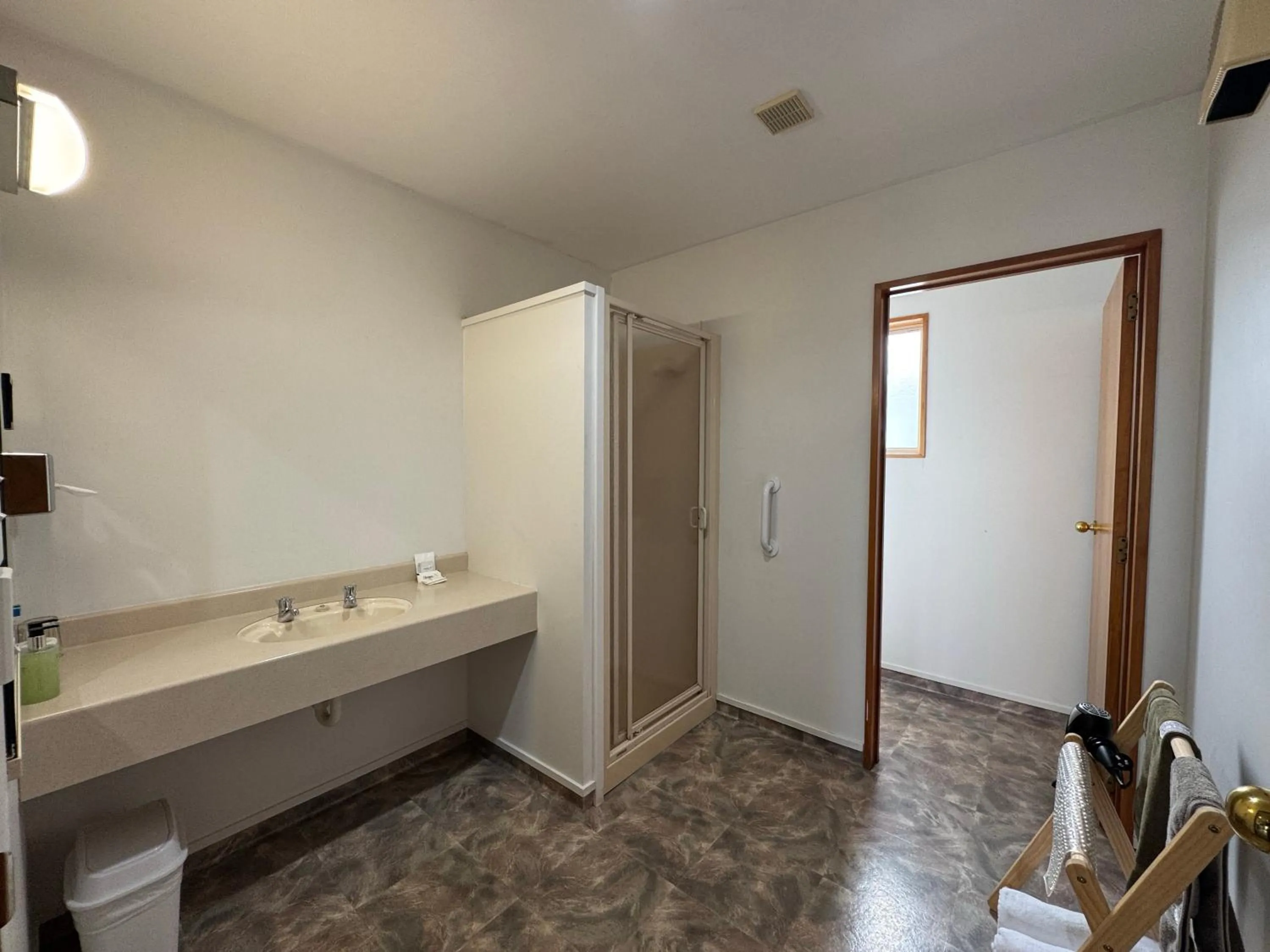 Bathroom in ASURE Ambassador Motor Lodge