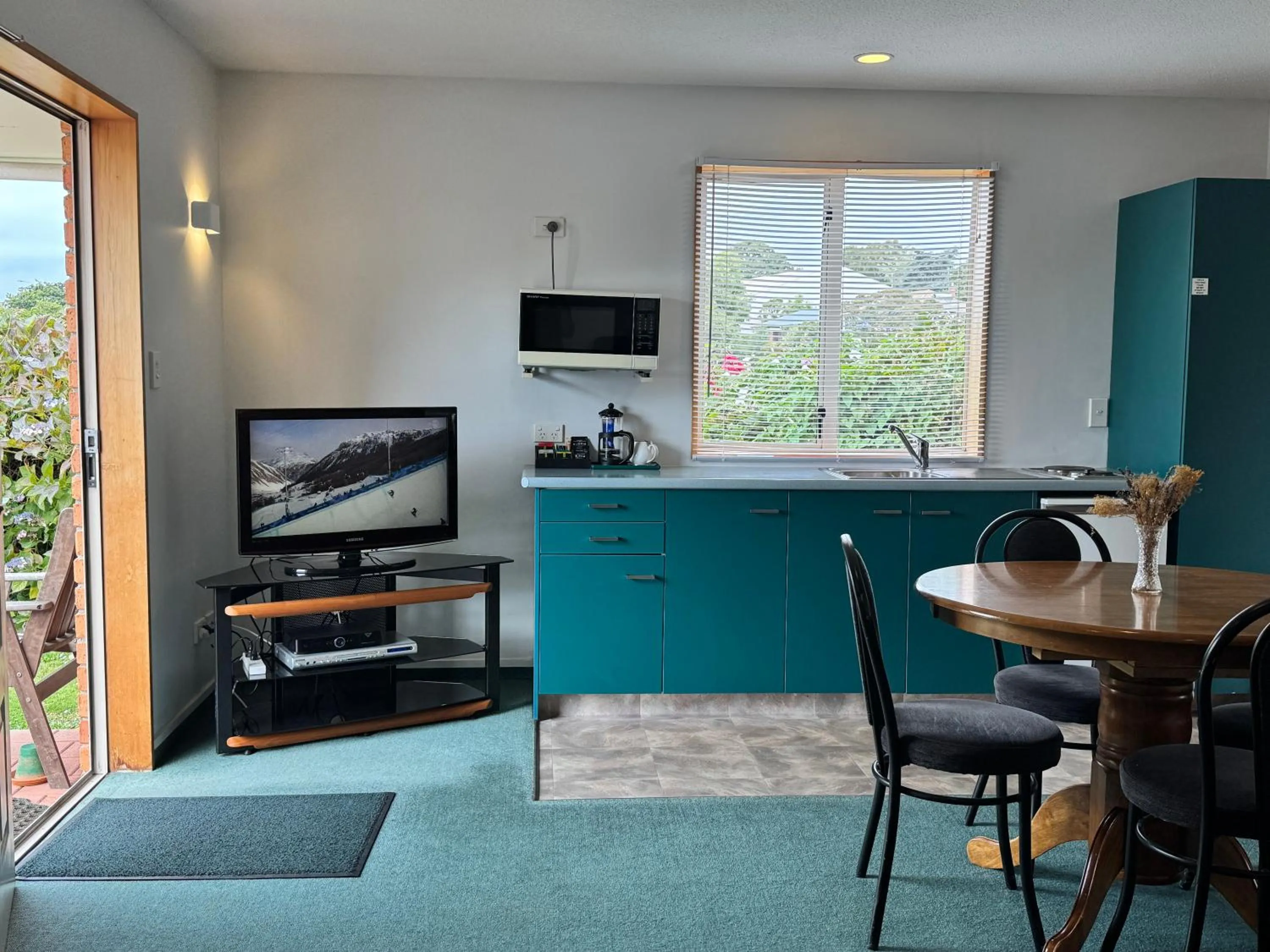 kitchen in ASURE Ambassador Motor Lodge