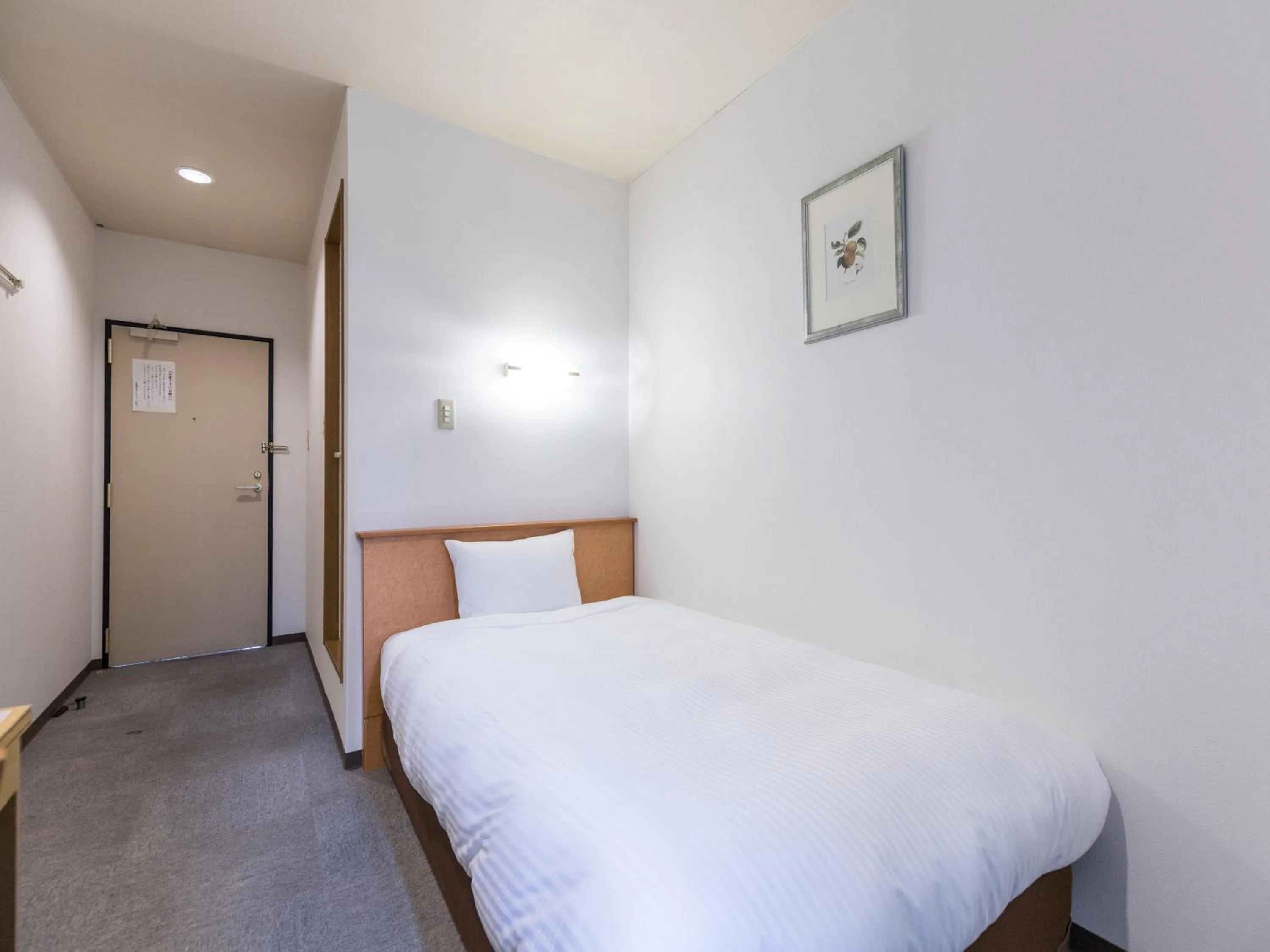 Bedroom, Bed in Hotel Isesaki East