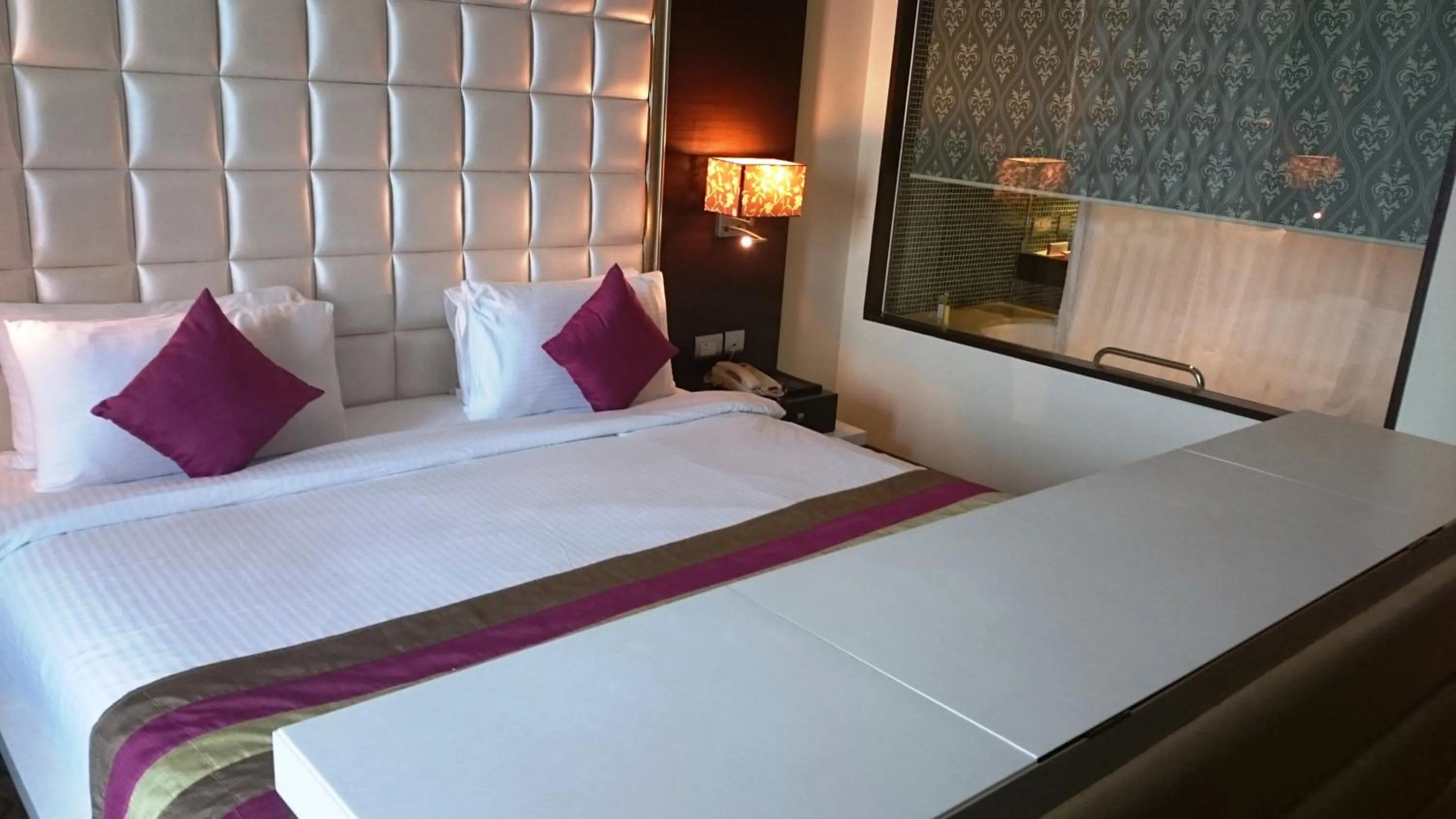 Bed in Ramada by Wyndham Navi Mumbai