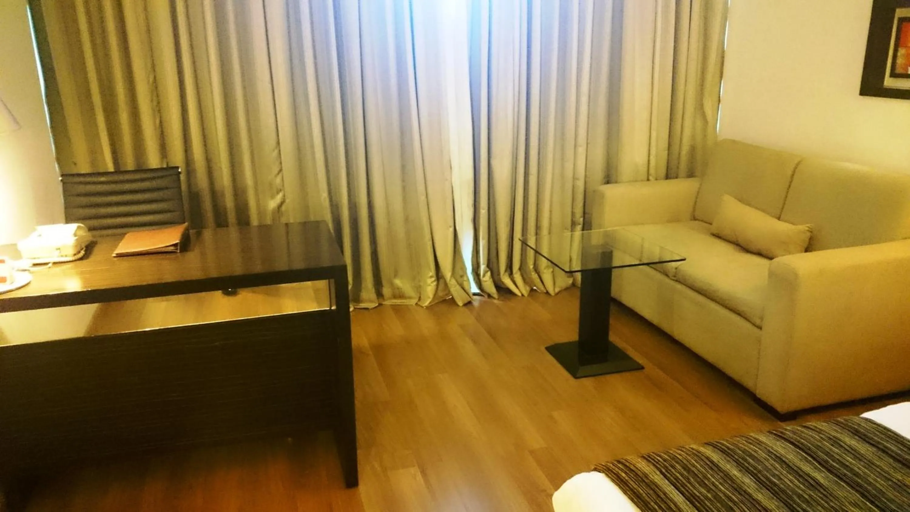 Seating area in Ramada by Wyndham Navi Mumbai