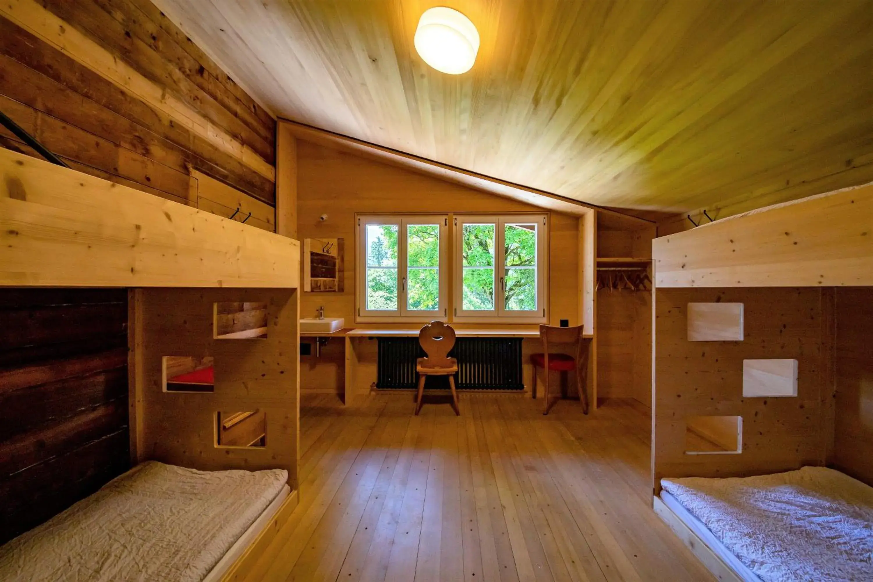 Quadruple Room with Shared Bathroom in Naturfreunde Hostel Grindelwald Quadruple Room with Shared Bathroom in Naturfreunde Hostel Grindelwald