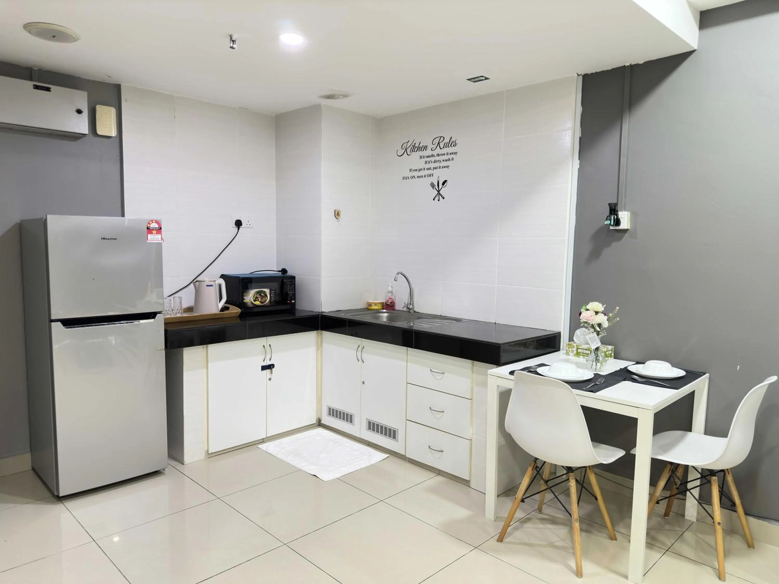 Kitchen or kitchenette in Cahaya Qaira Homestay @ D'Perdana Kota Bharu