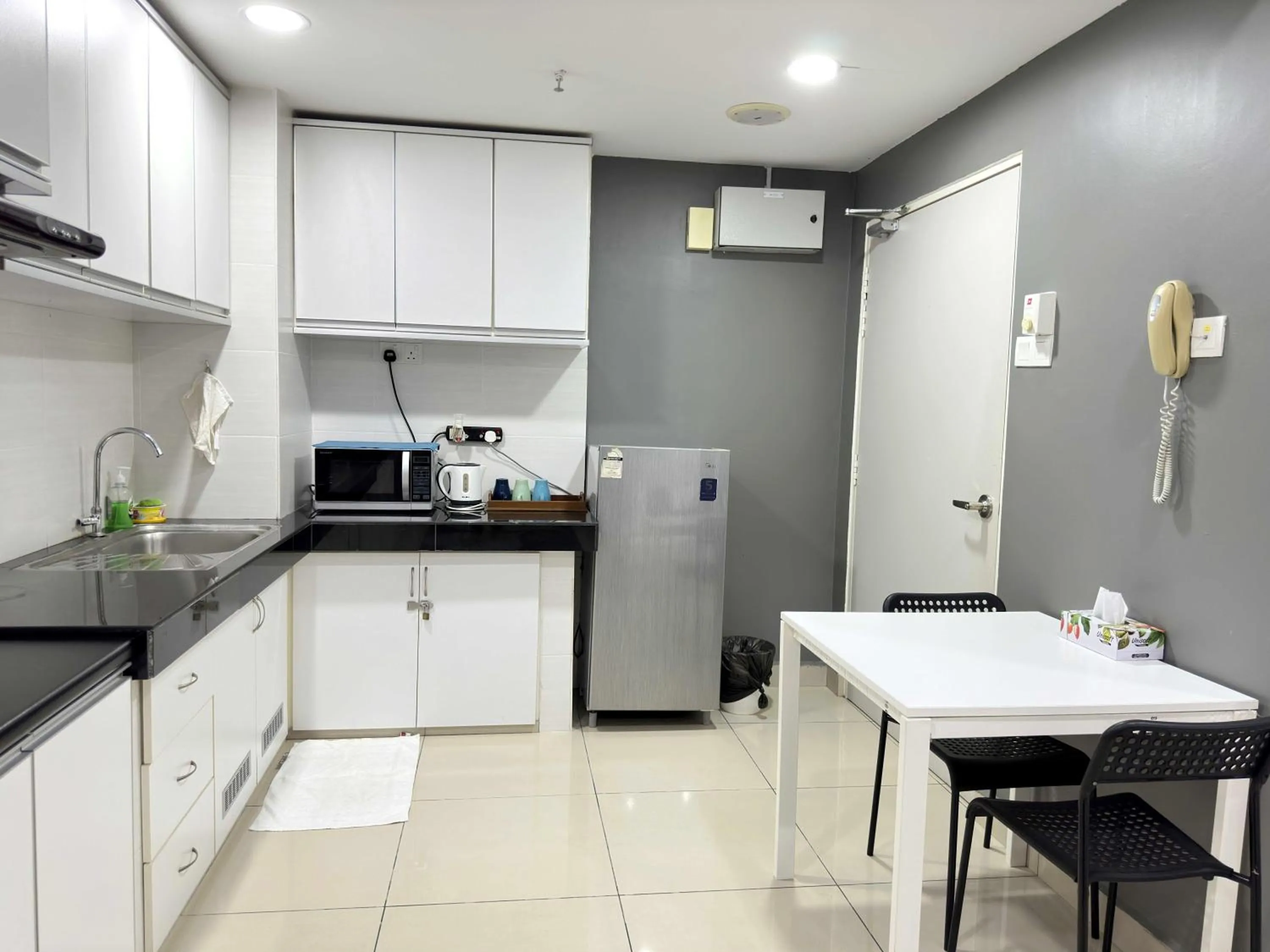 Kitchen or kitchenette in Cahaya Qaira Homestay @ D'Perdana Kota Bharu