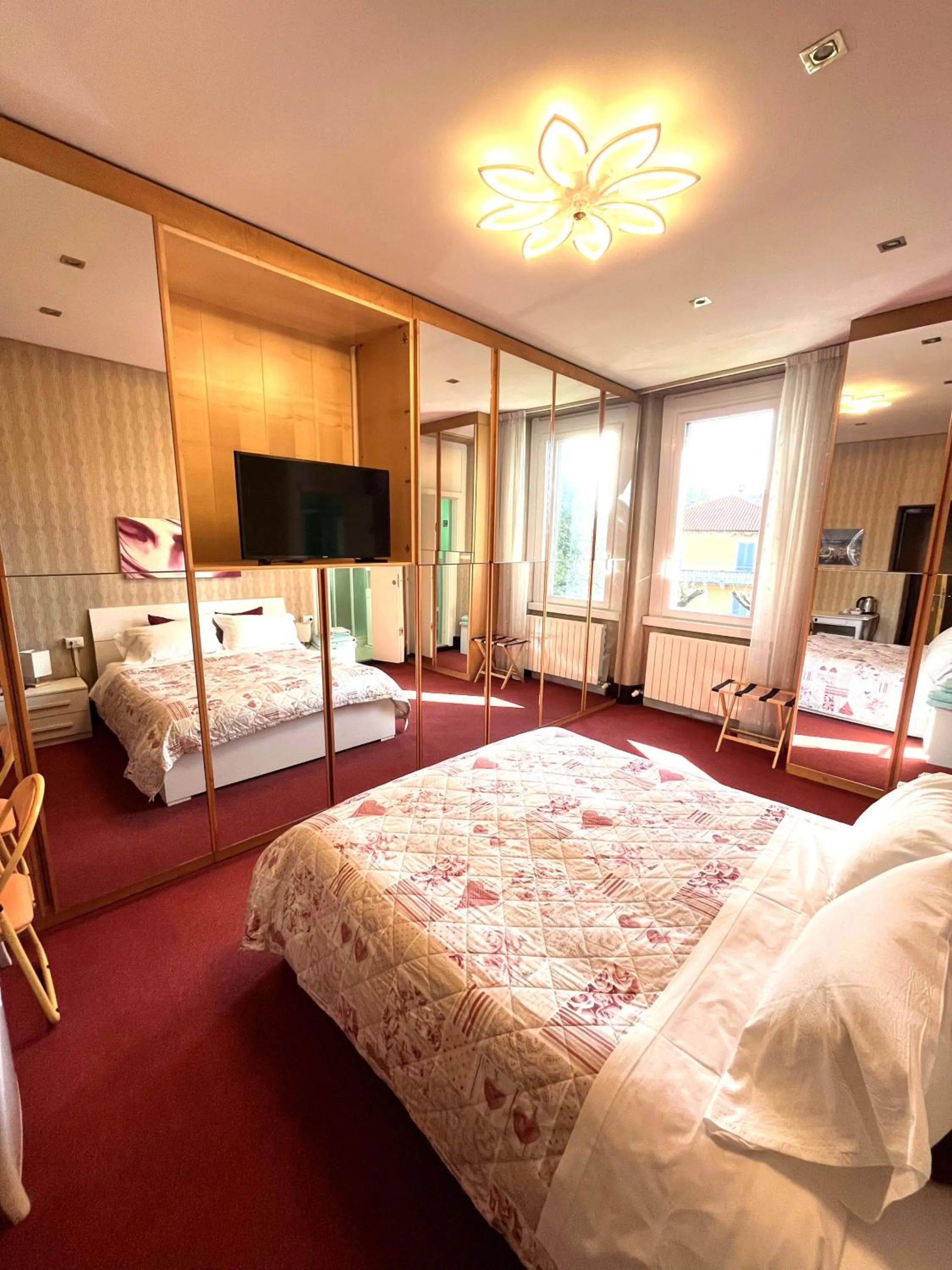 Photo of the whole room, Bed in B&B VILLA ADRIANA Varese - camere e appartamenti