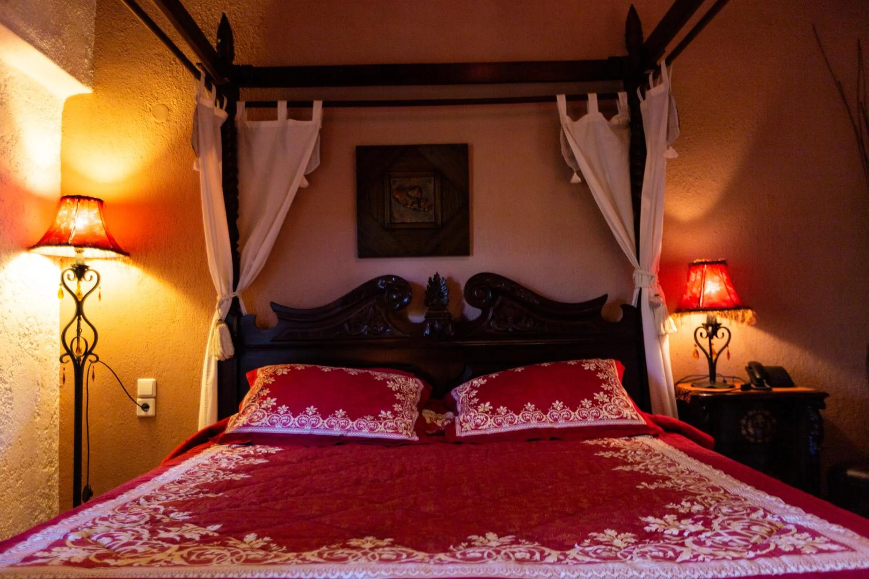 Bed in La Moara Boutique Hotel