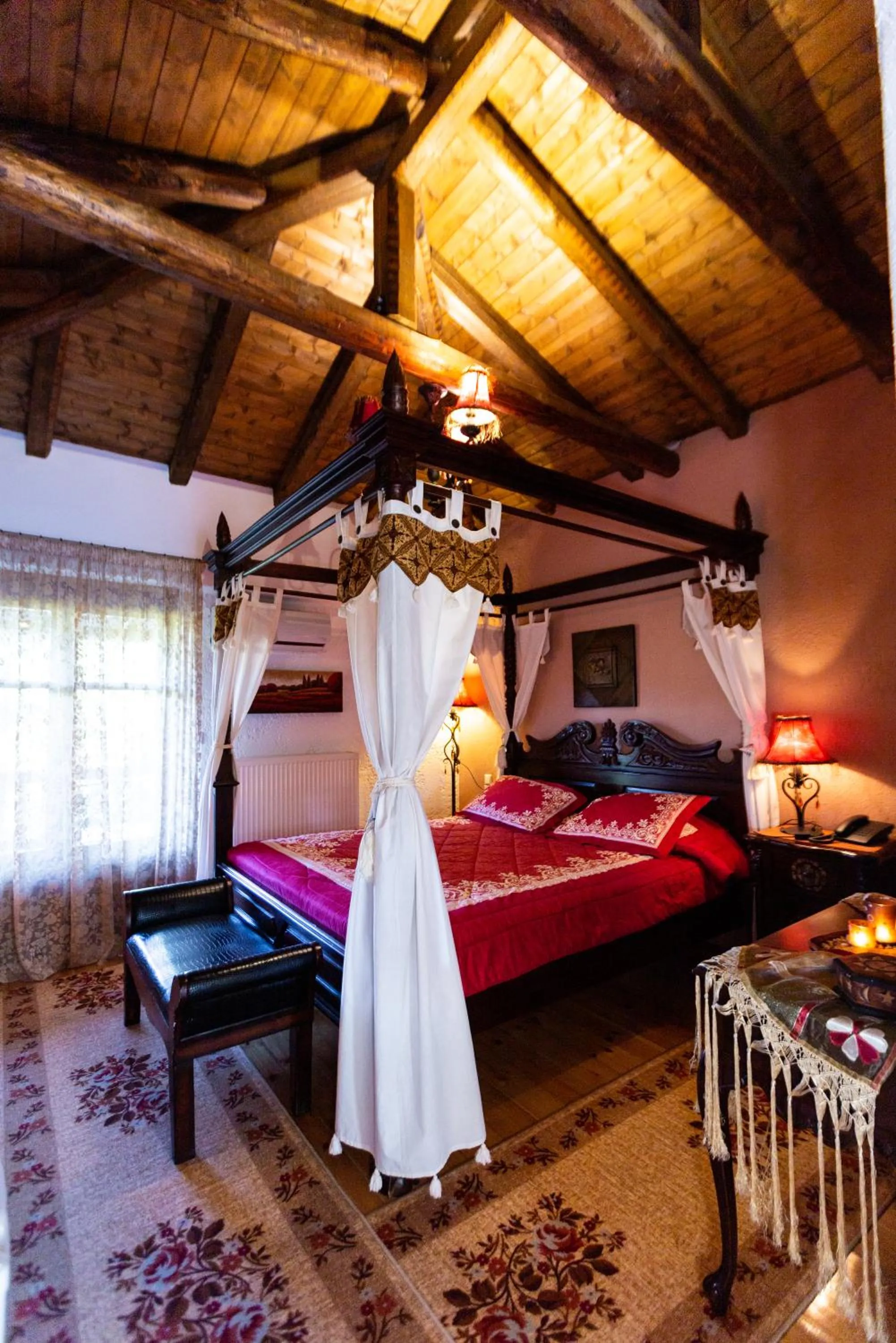 Bed in La Moara Boutique Hotel