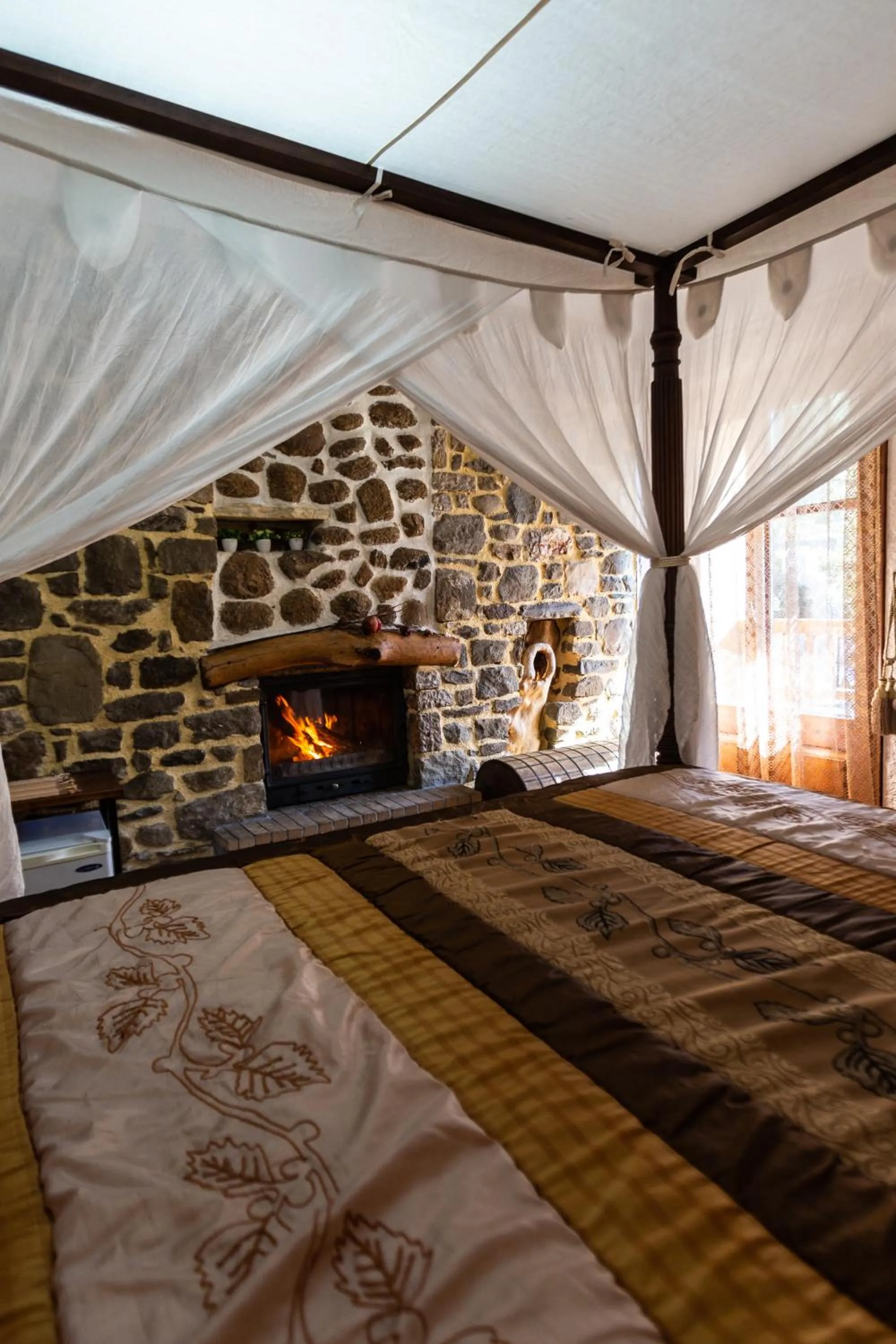 Bed in La Moara Boutique Hotel