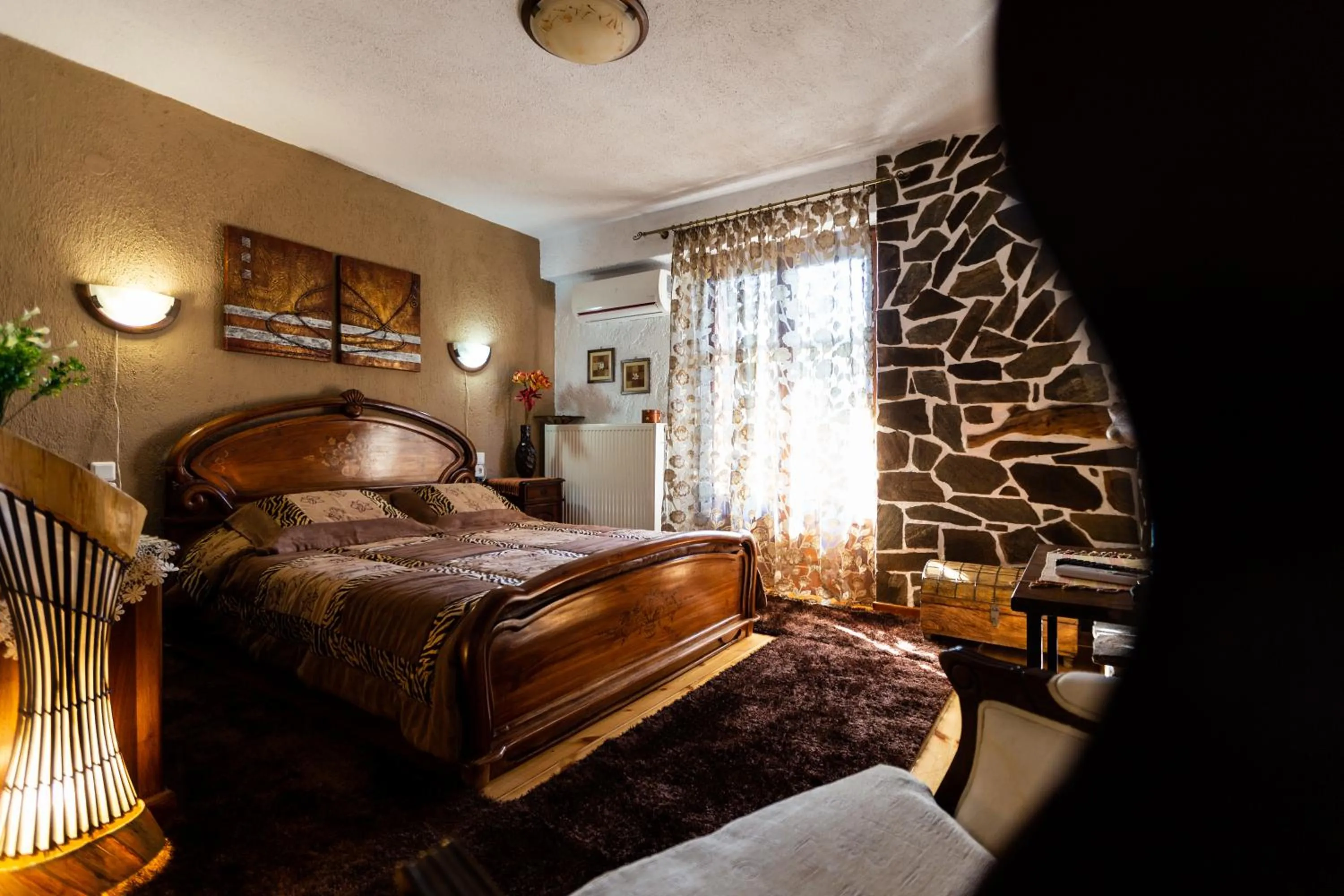 Bed in La Moara Boutique Hotel
