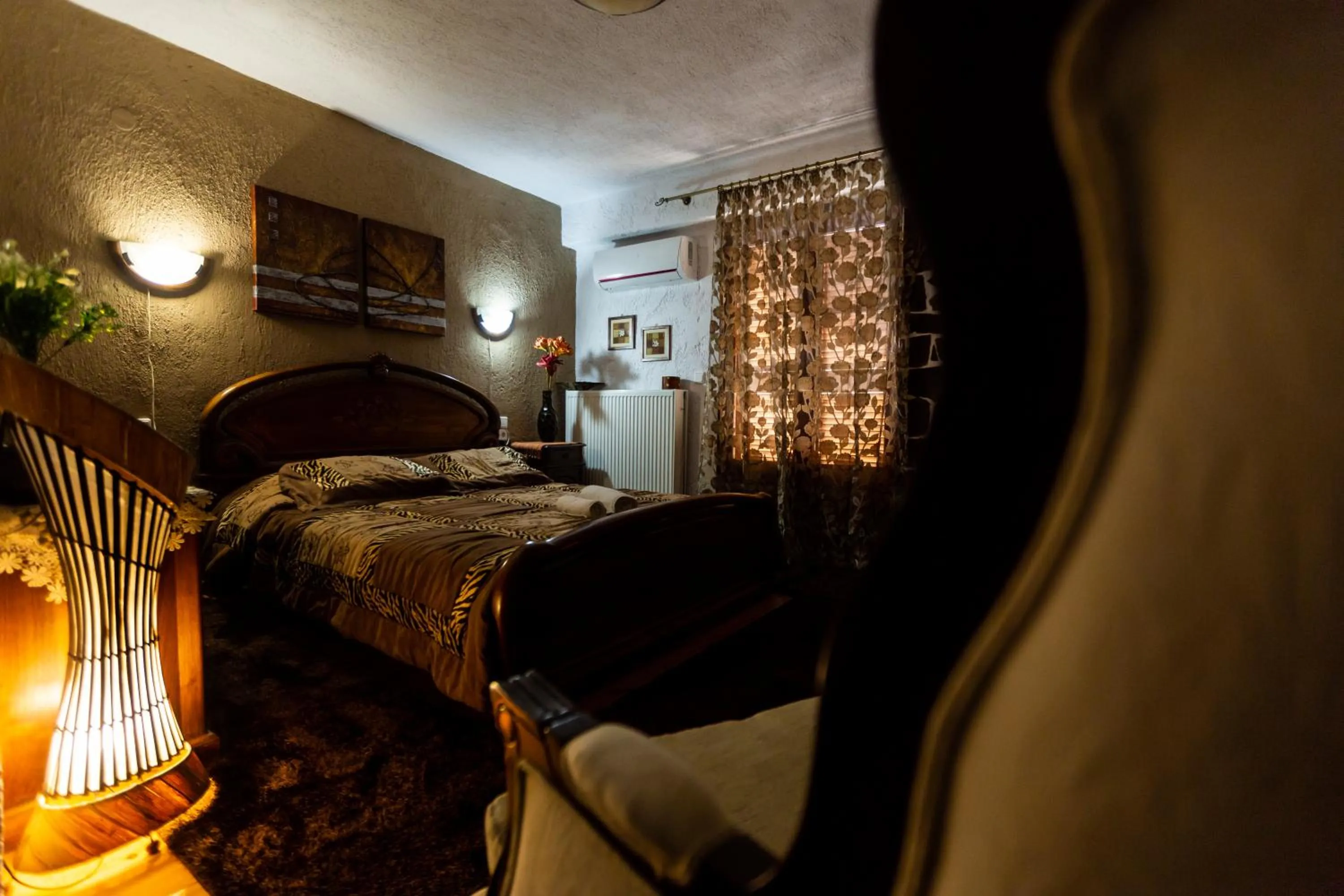 Bed in La Moara Boutique Hotel