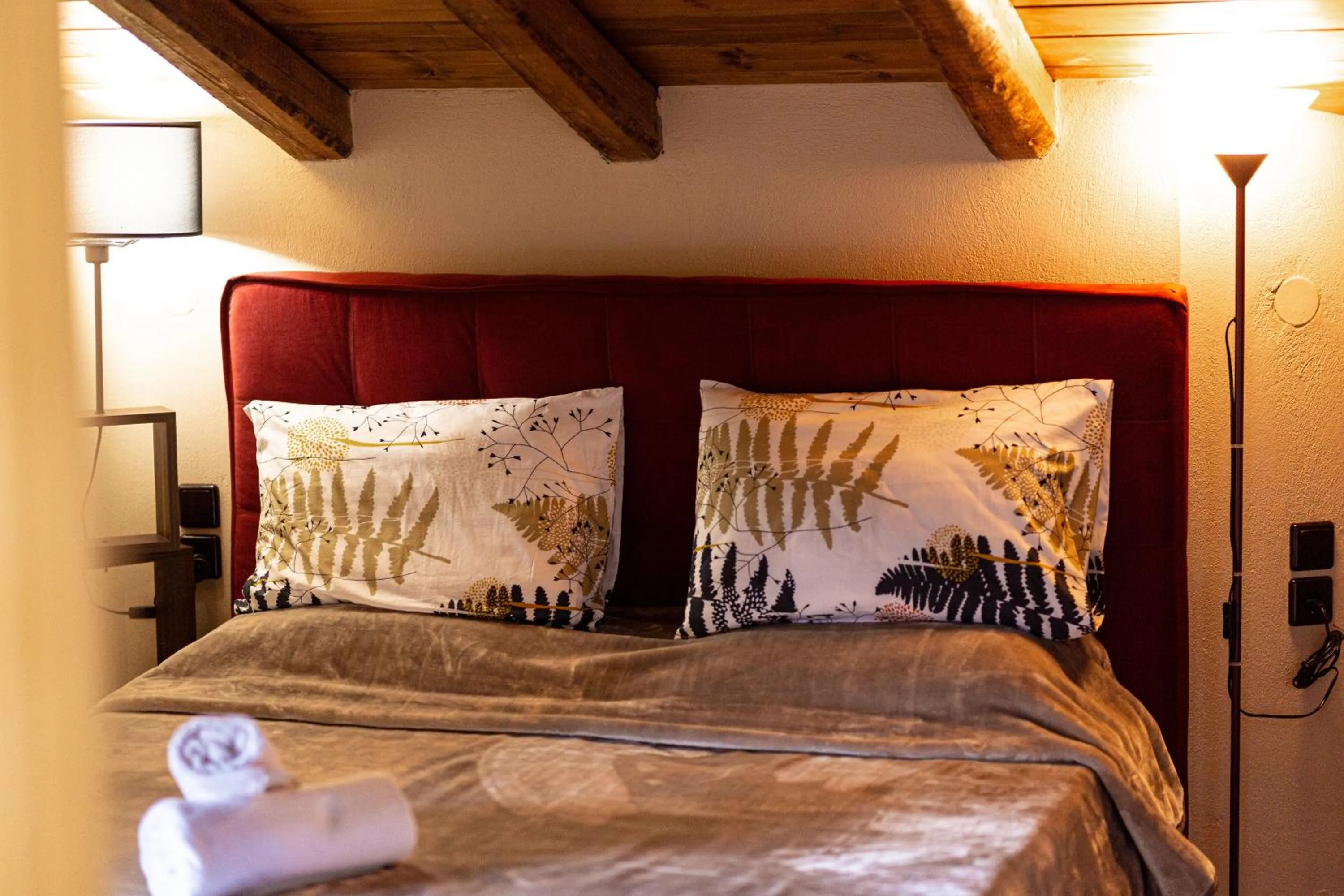Bed in La Moara Boutique Hotel