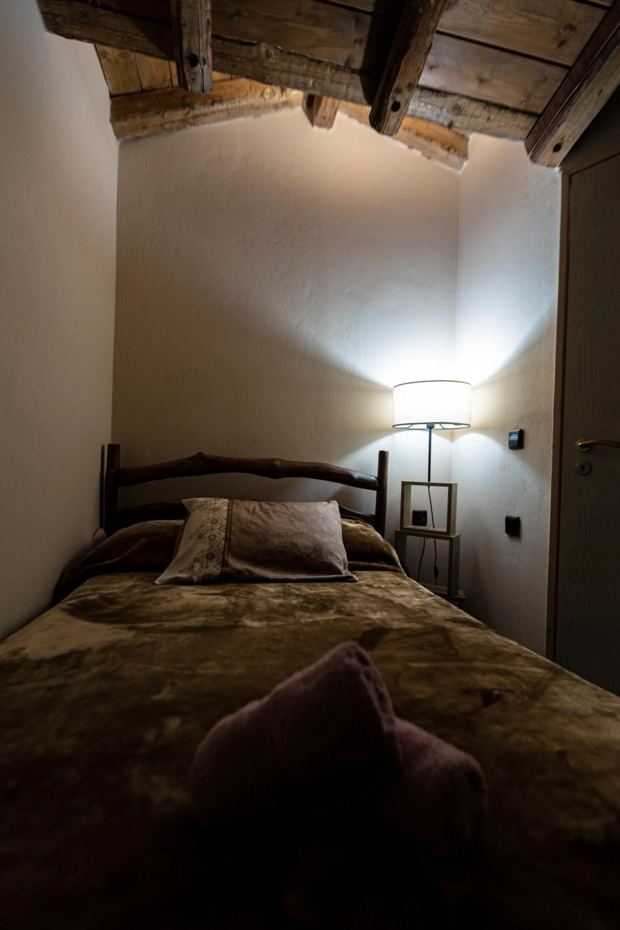 Bed in La Moara Boutique Hotel