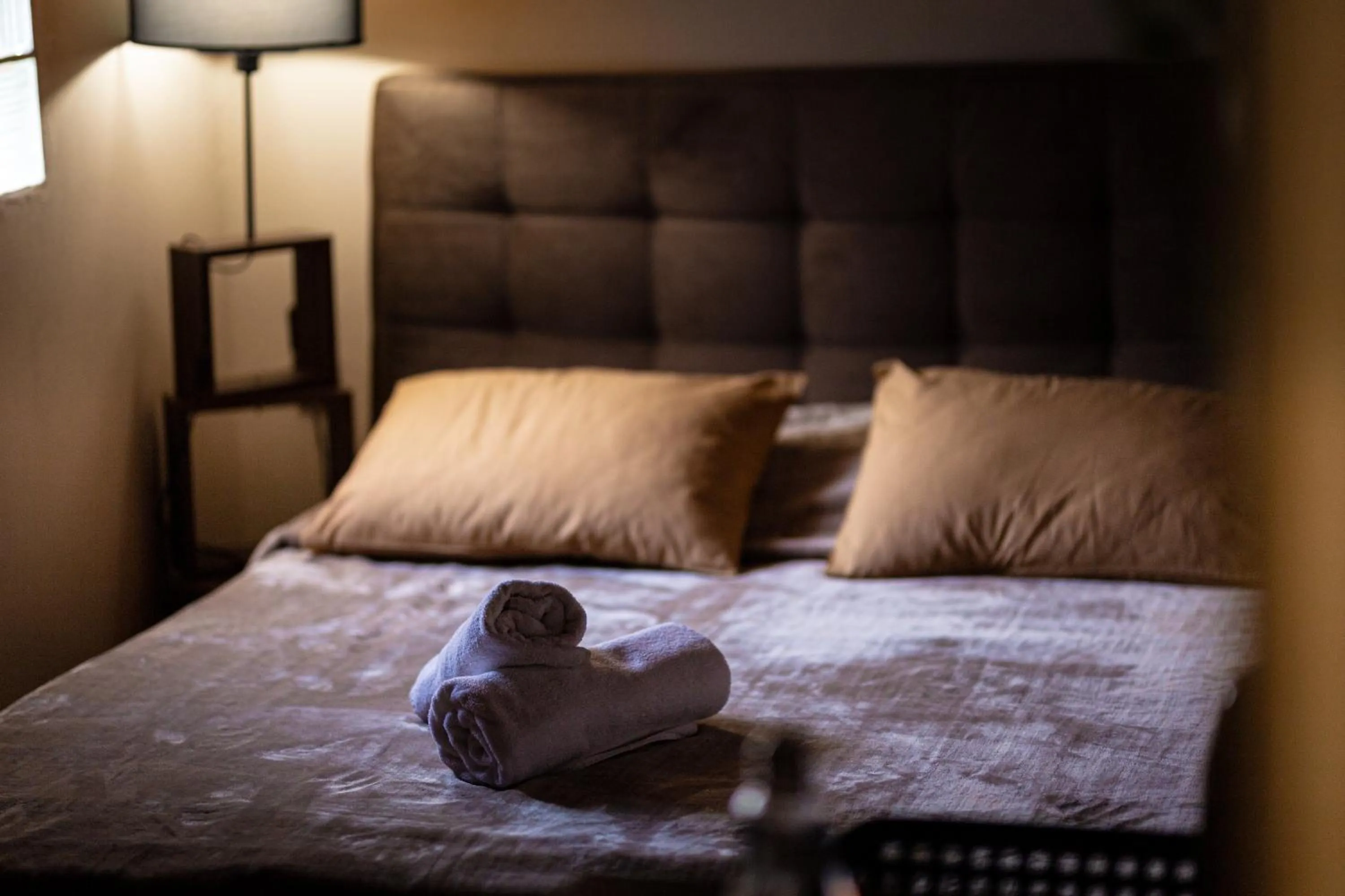 Bed in La Moara Boutique Hotel