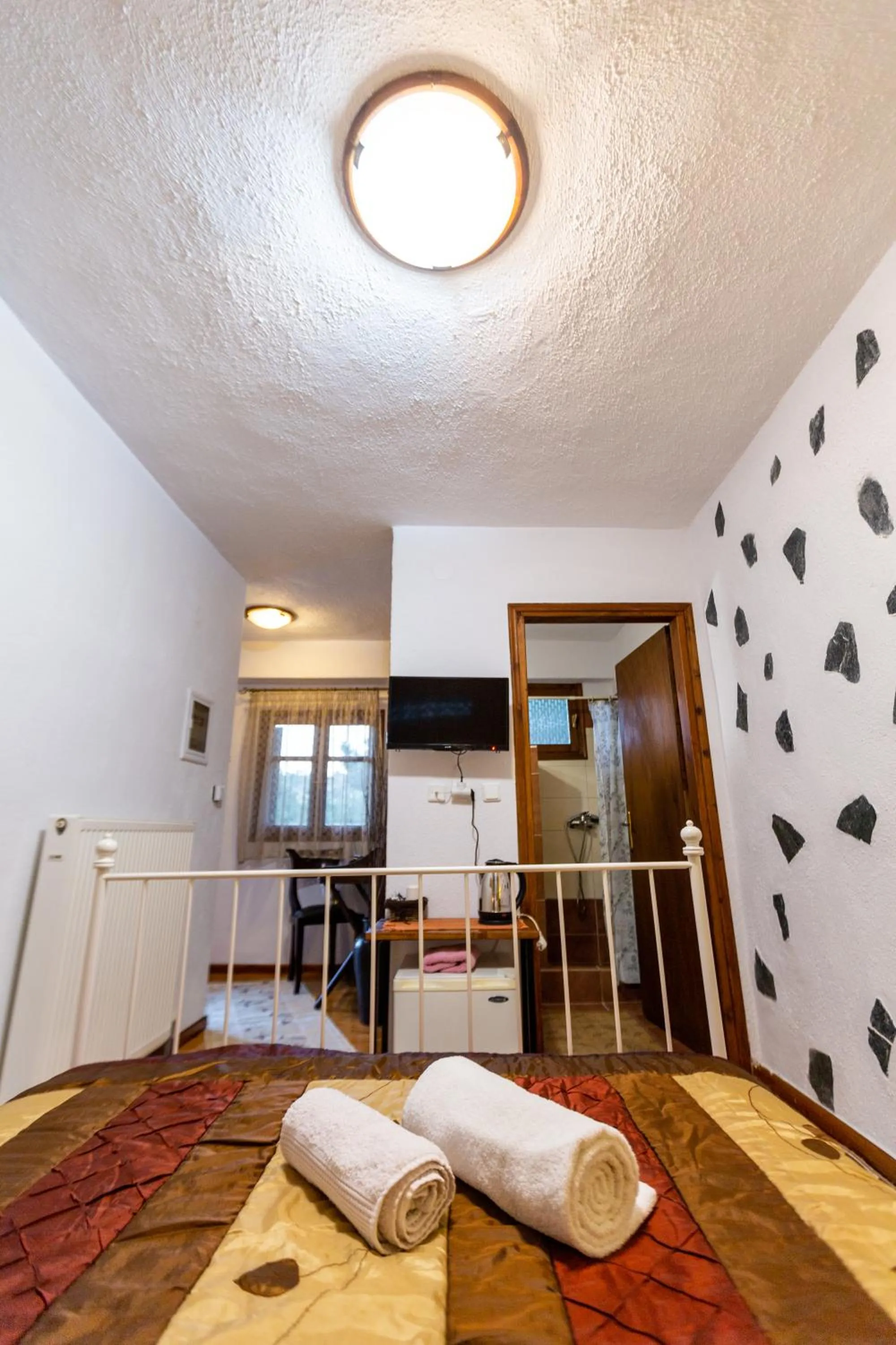 Bed in La Moara Boutique Hotel