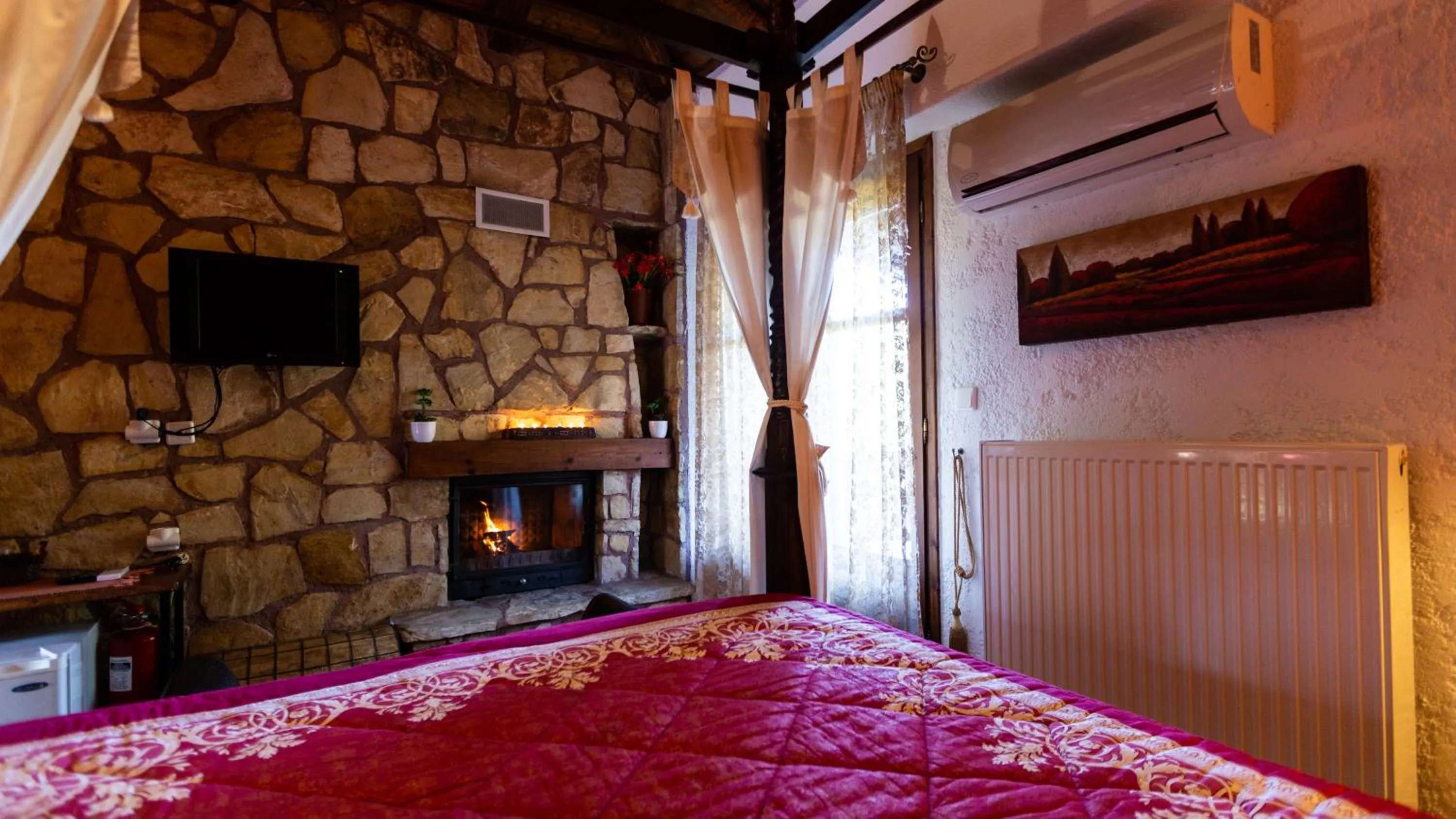 Bed in La Moara Boutique Hotel