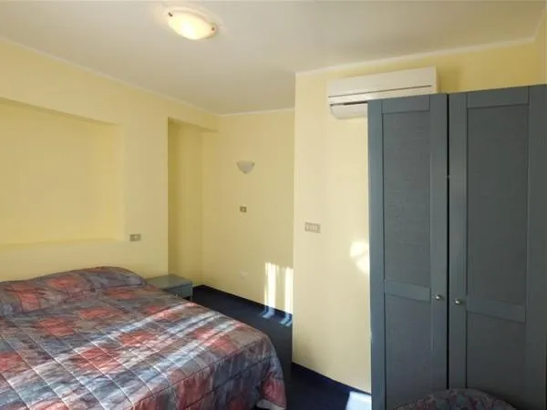 Bed in Garni Hotel Siesta